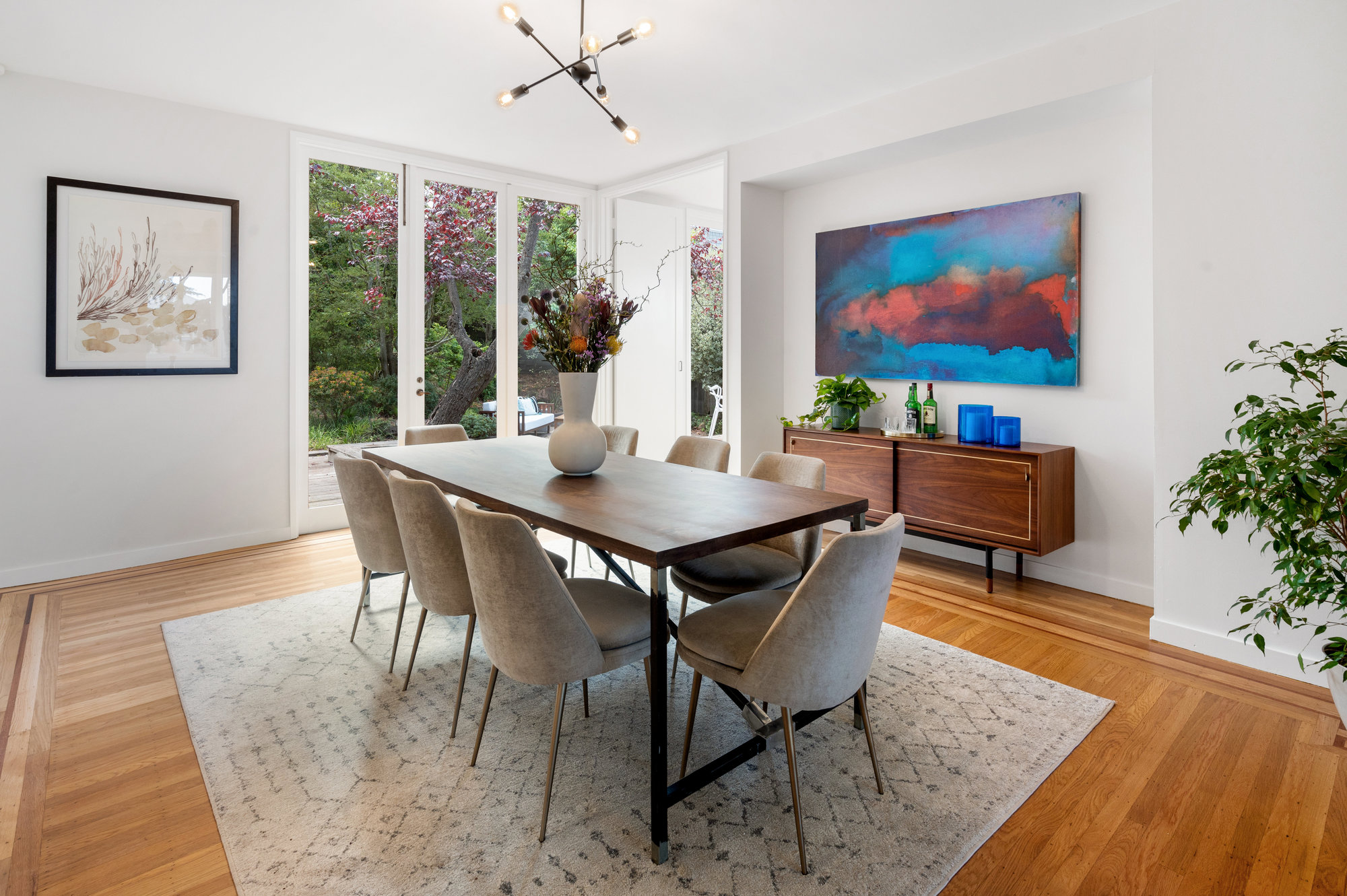 033026 Dining room with wood floors and floor to ceiling windows