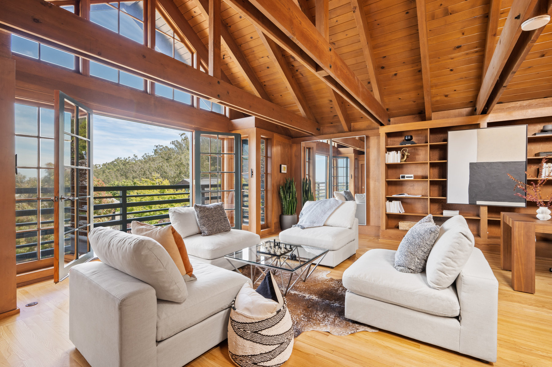 Sitting area in upper level.  There are built in book cases and large french door that opens up to Edgewood ave.