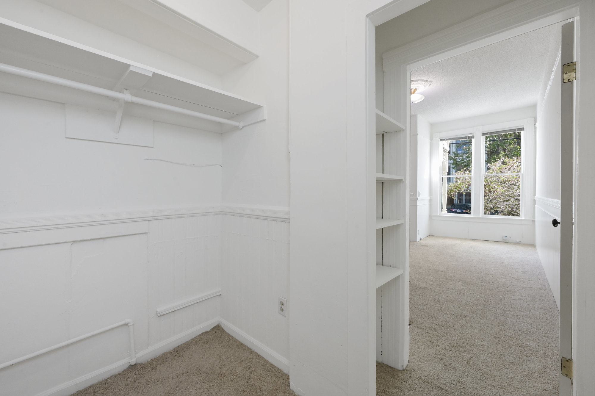 037044 View of a walk-in closet with plenty of storage space