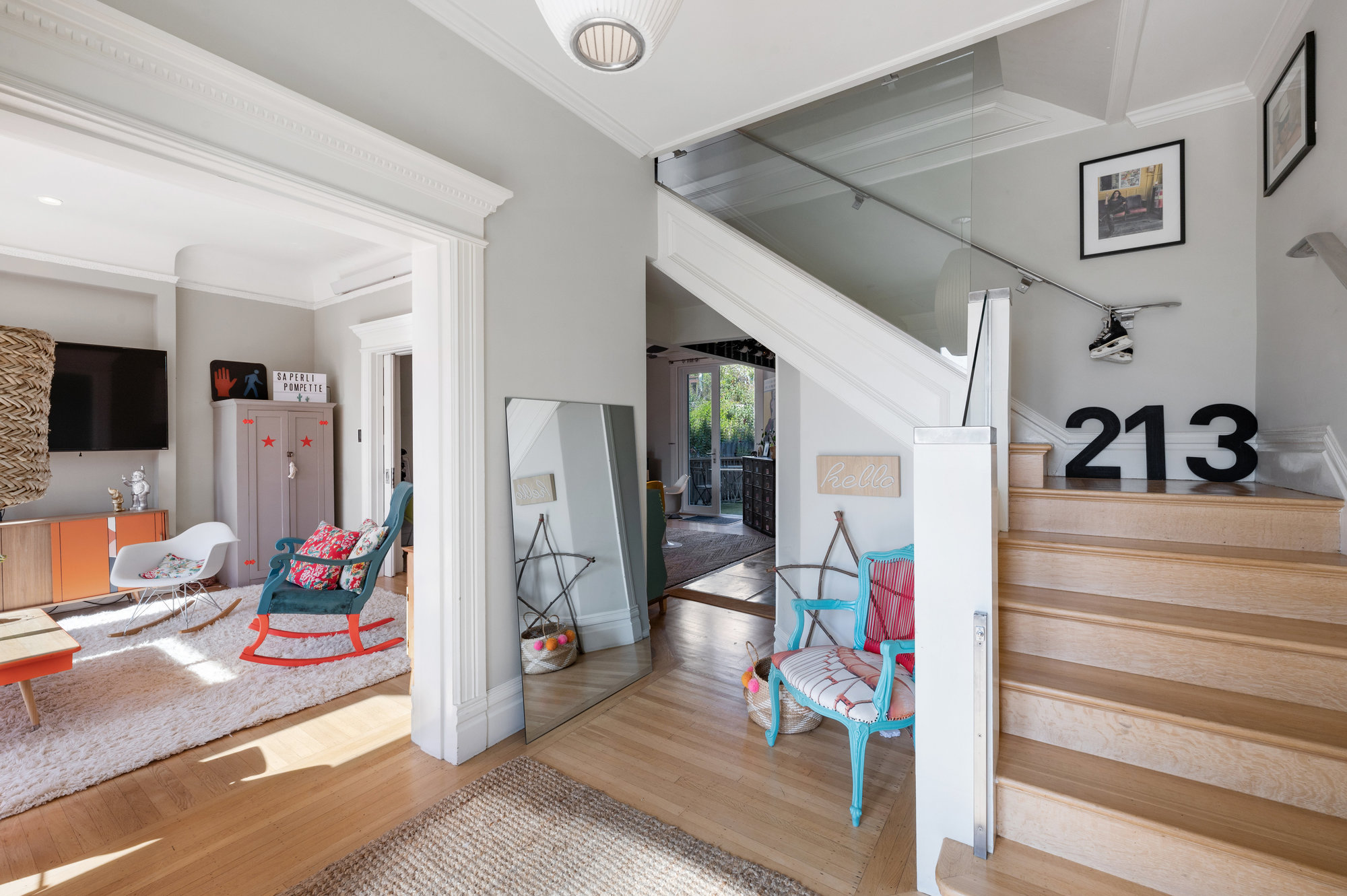 View of the wood steps and front entry to 834 Clayton Street in San Francisco