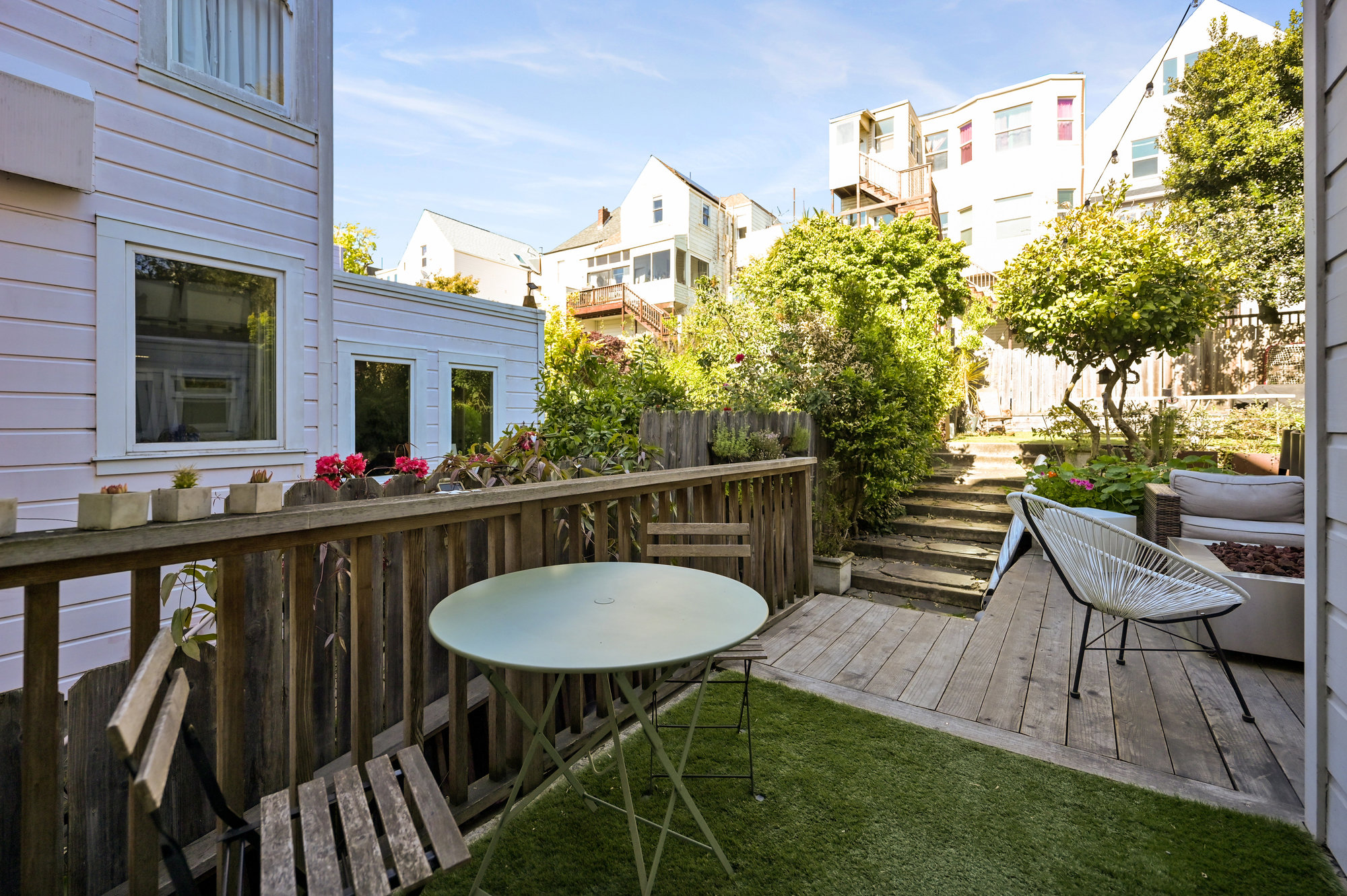 Deck area adjacent to the dining room, featuring a view of the large yard