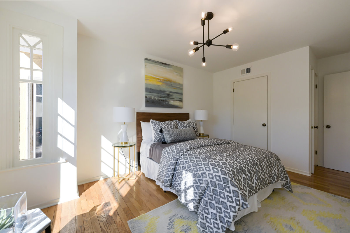 044076 Bedroom three, featuring wood floors
