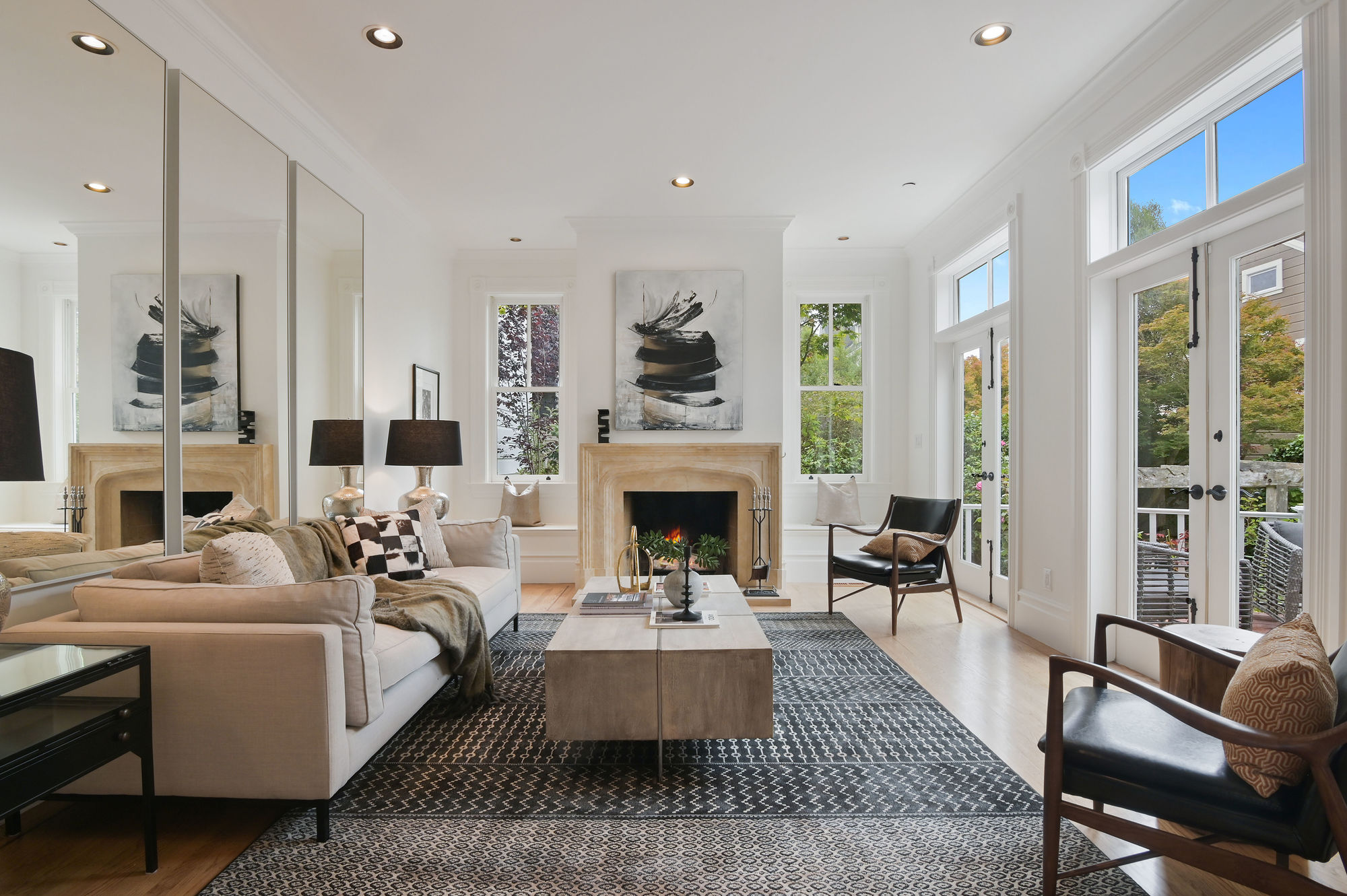 Living room with wood floors and double french doors
