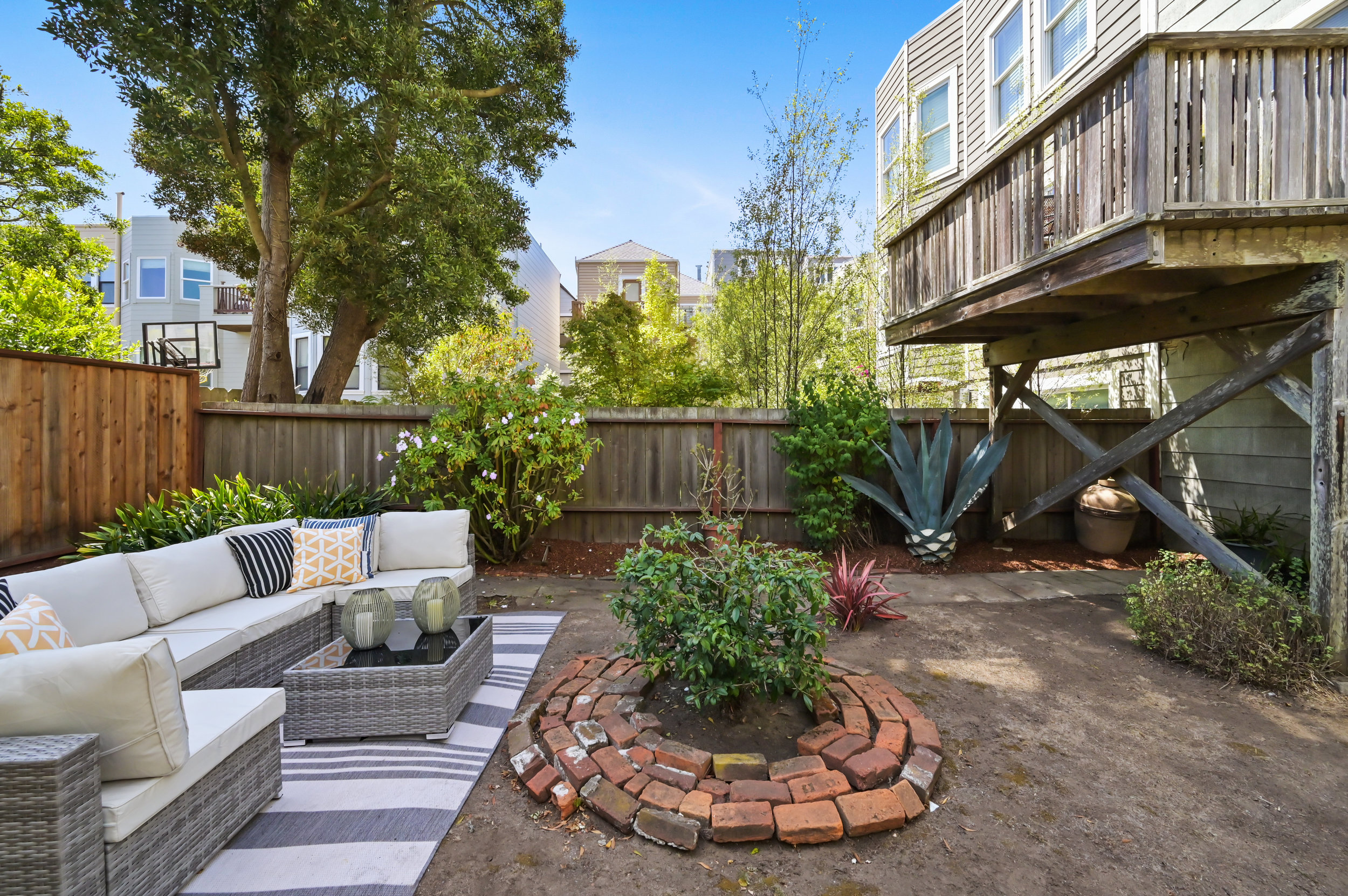 Outdoor living area with fenced in yard for privacy