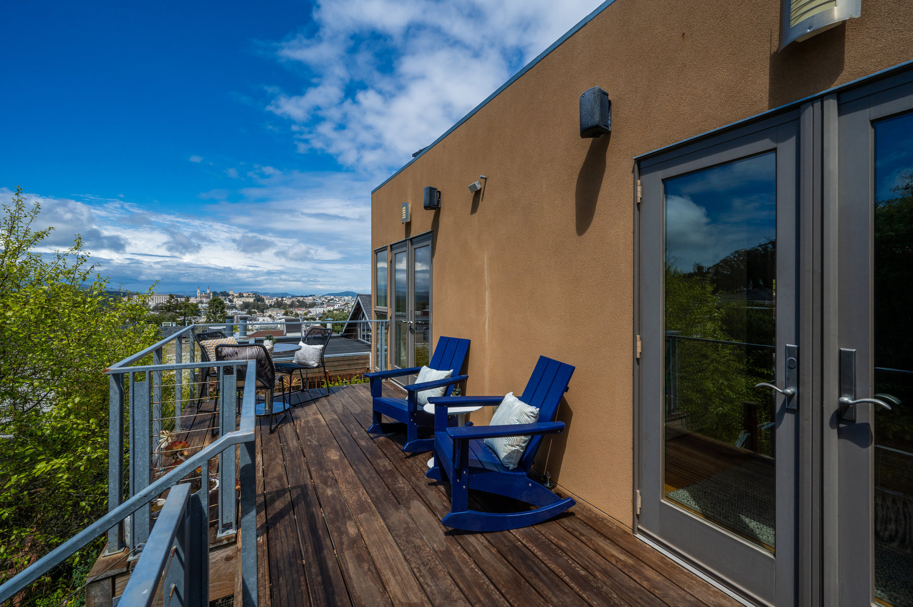 Looking at both seating areas from corner of deck.