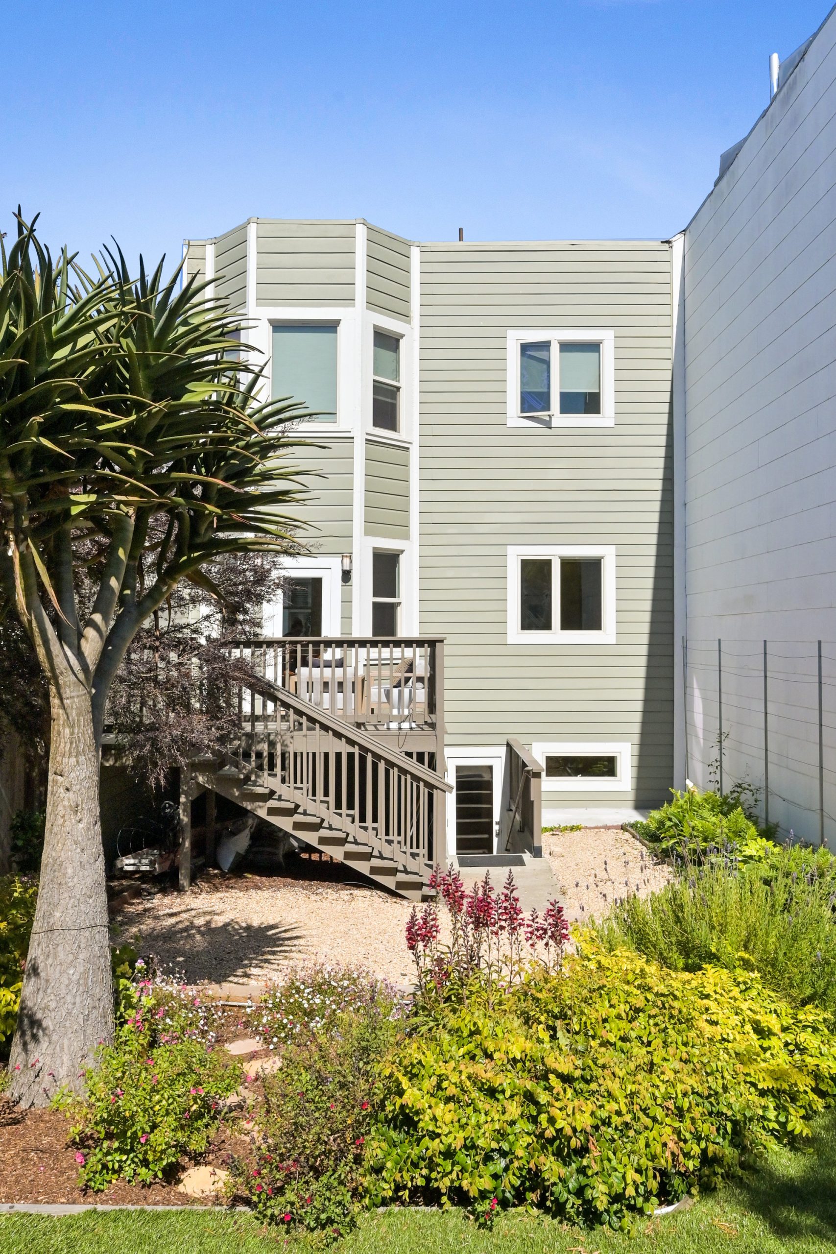 Rear exterior view of 719 18th Avenue, showing a multi-level home