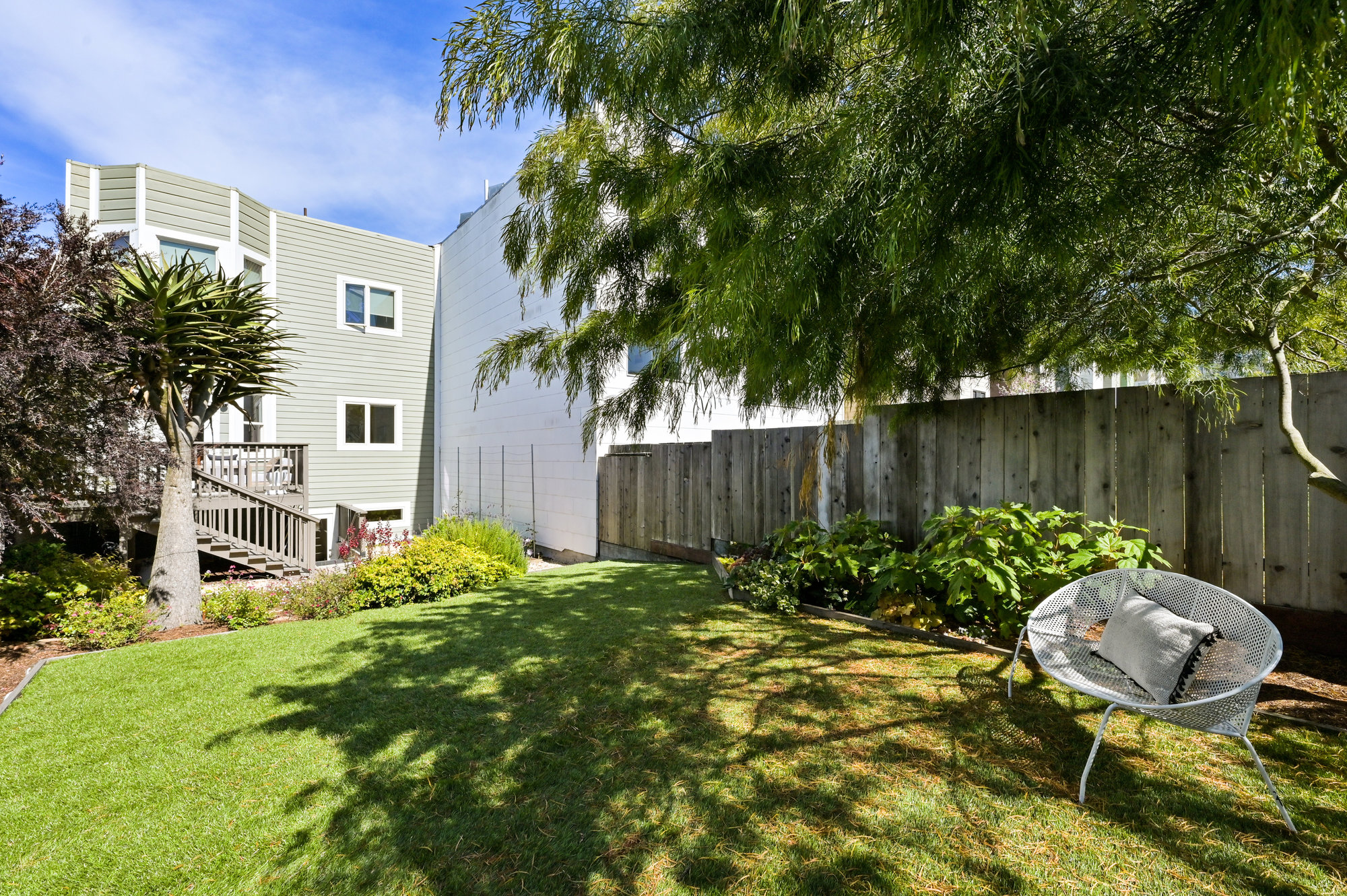 View from the rear yard, showing the exterior facade of 719 18th Avenue