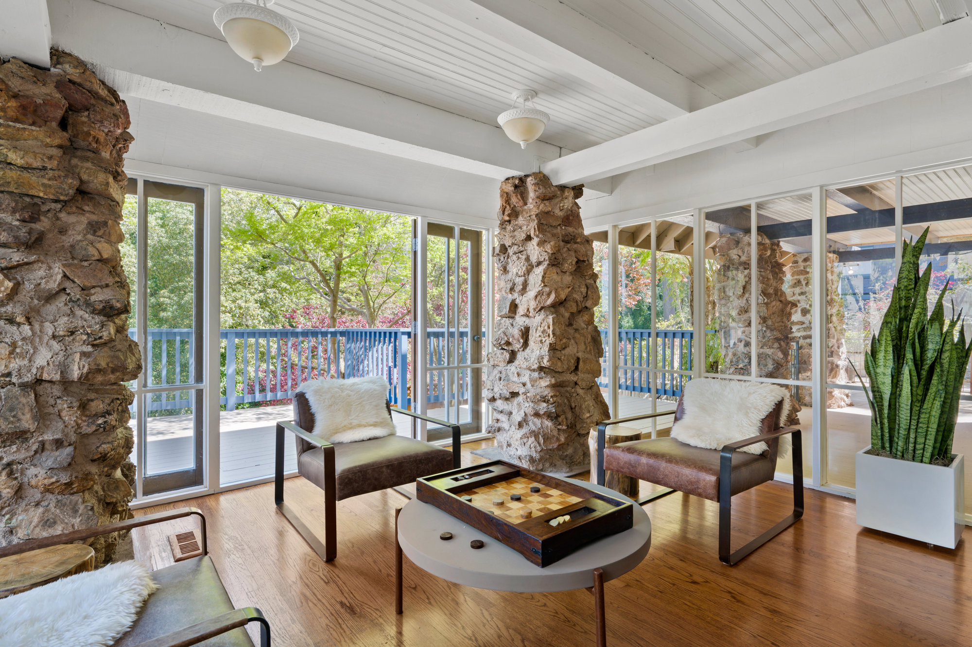 054photos281edgewood030 Sitting area that is surrounded by glass windows.
