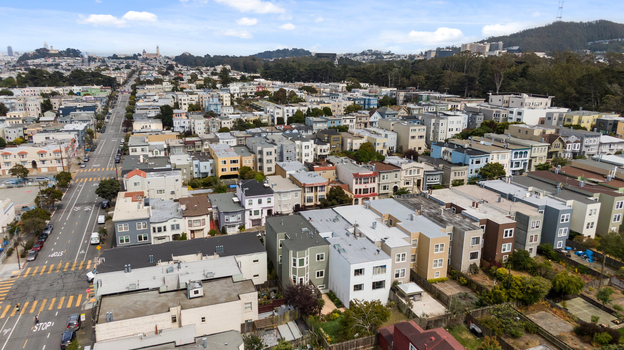 Aerial view of 719 18th Avenue, showing Sutro Tower, and the Mission in the distance