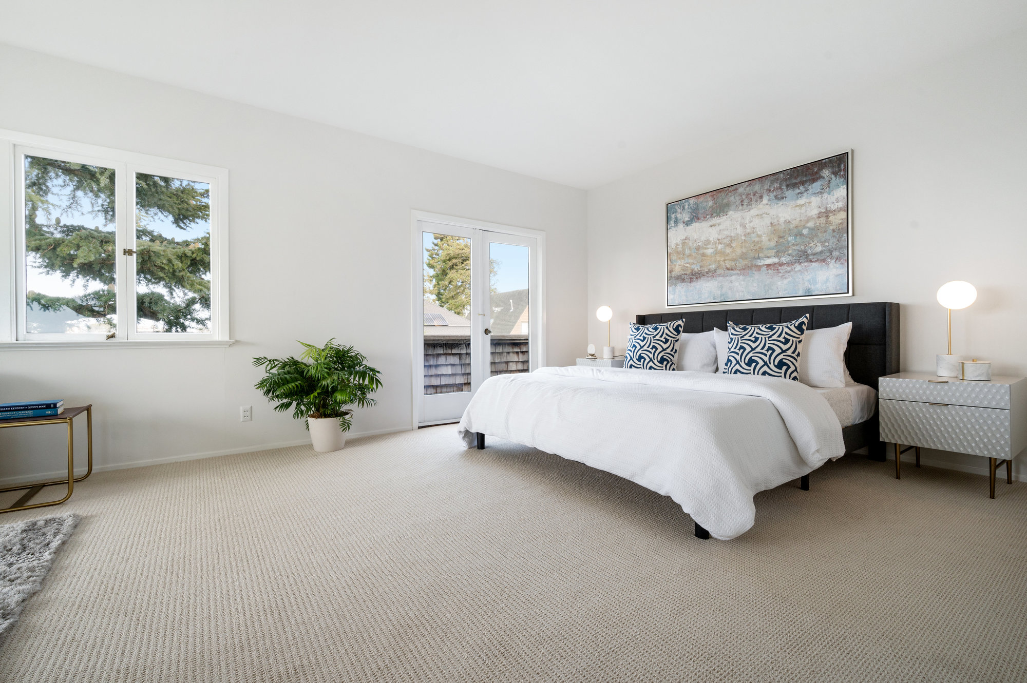 058070 Primary bedroom with French doors leading to adjoining deck