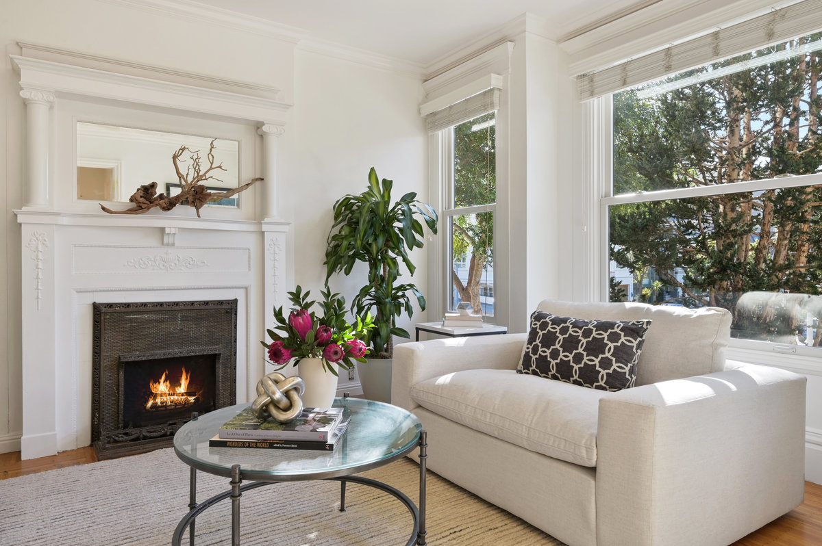 062100-vs2 Close-up of the fireplace with white mantel and frame