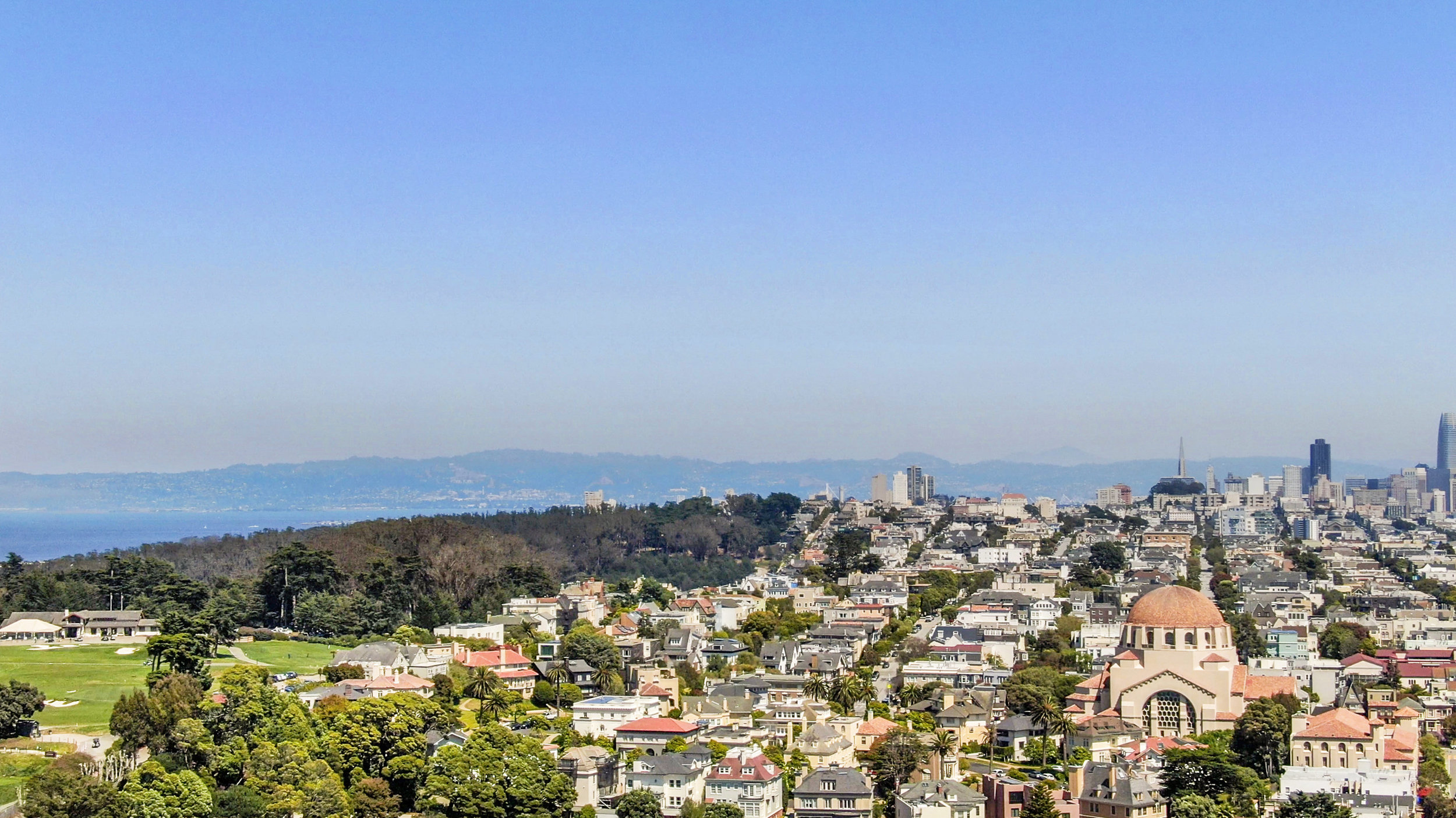 Aerial view from 637-639 Lake Street sold and marketed by John DiDomenico, showing proximity to the Presidio and San Francisco Bay