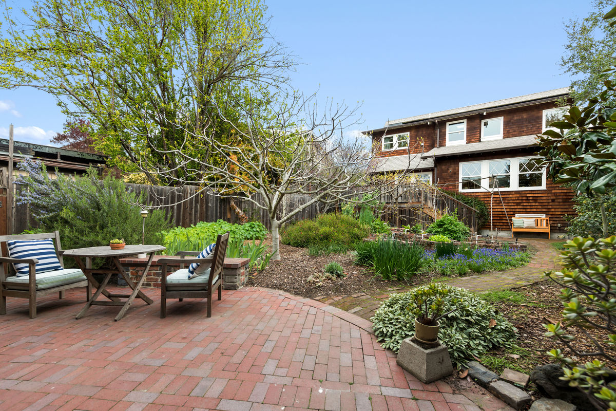 Brick outdoor patio with dining area