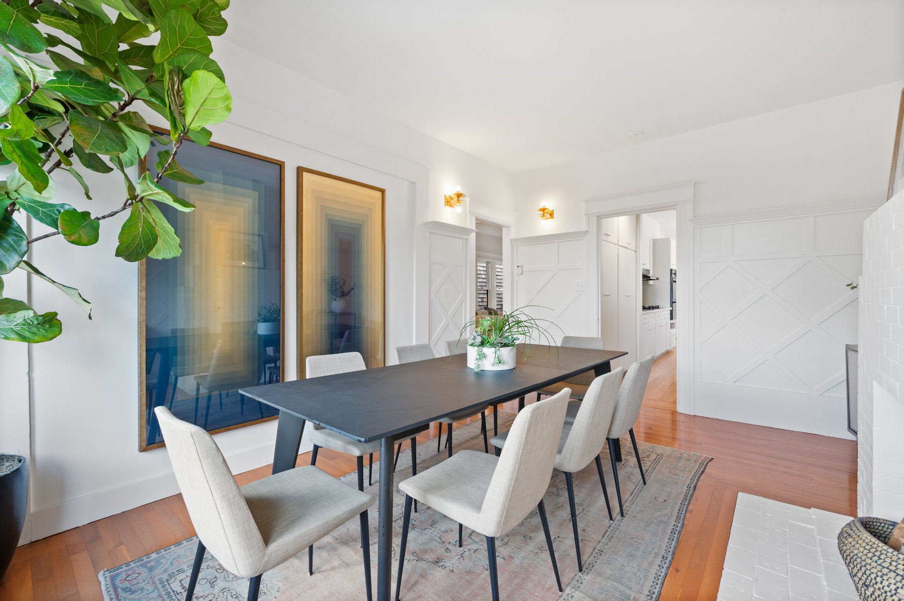 Looking over the dining table to entry way.