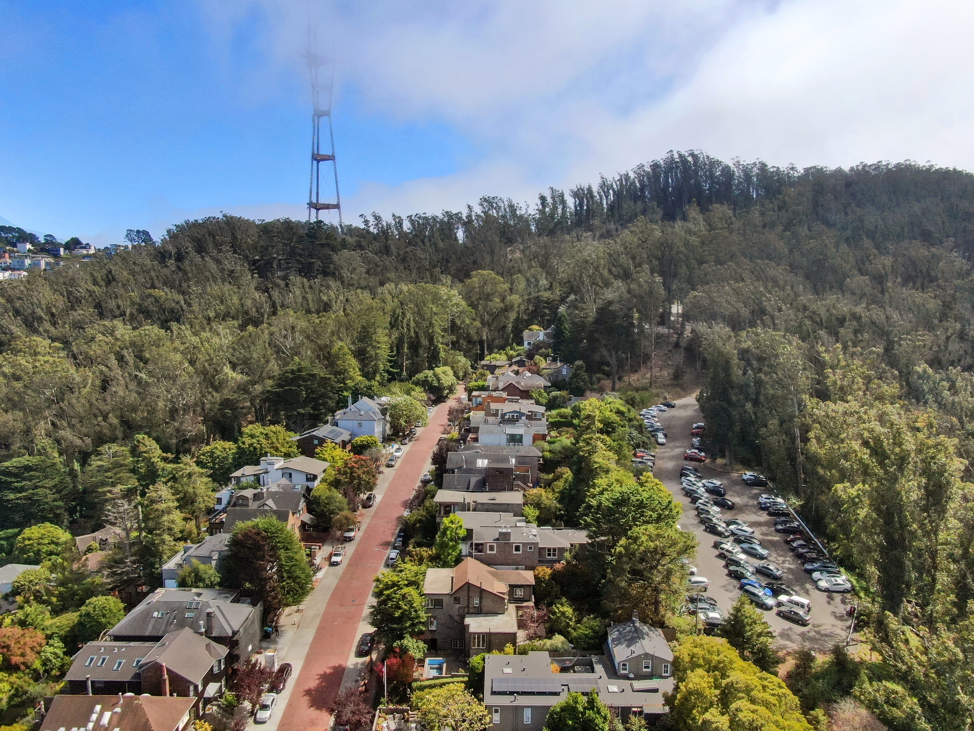 089122 Aerial view of 183 Edgewood Avenue, showing the red brick road of Edgewood and proximity to UCSF parking