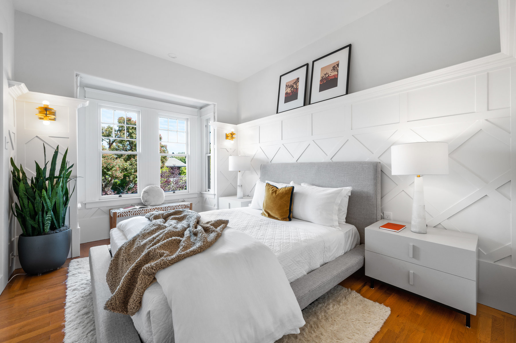 Photo of front bedroom that is off main entry way. Has windows that look out to Edgewood Ave