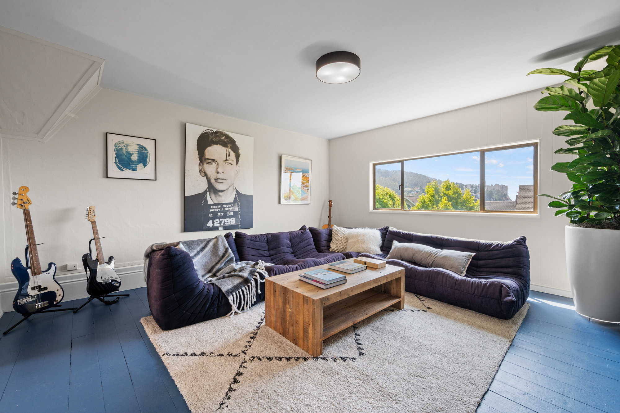 Bonus media room on the top floor, featuring large windows