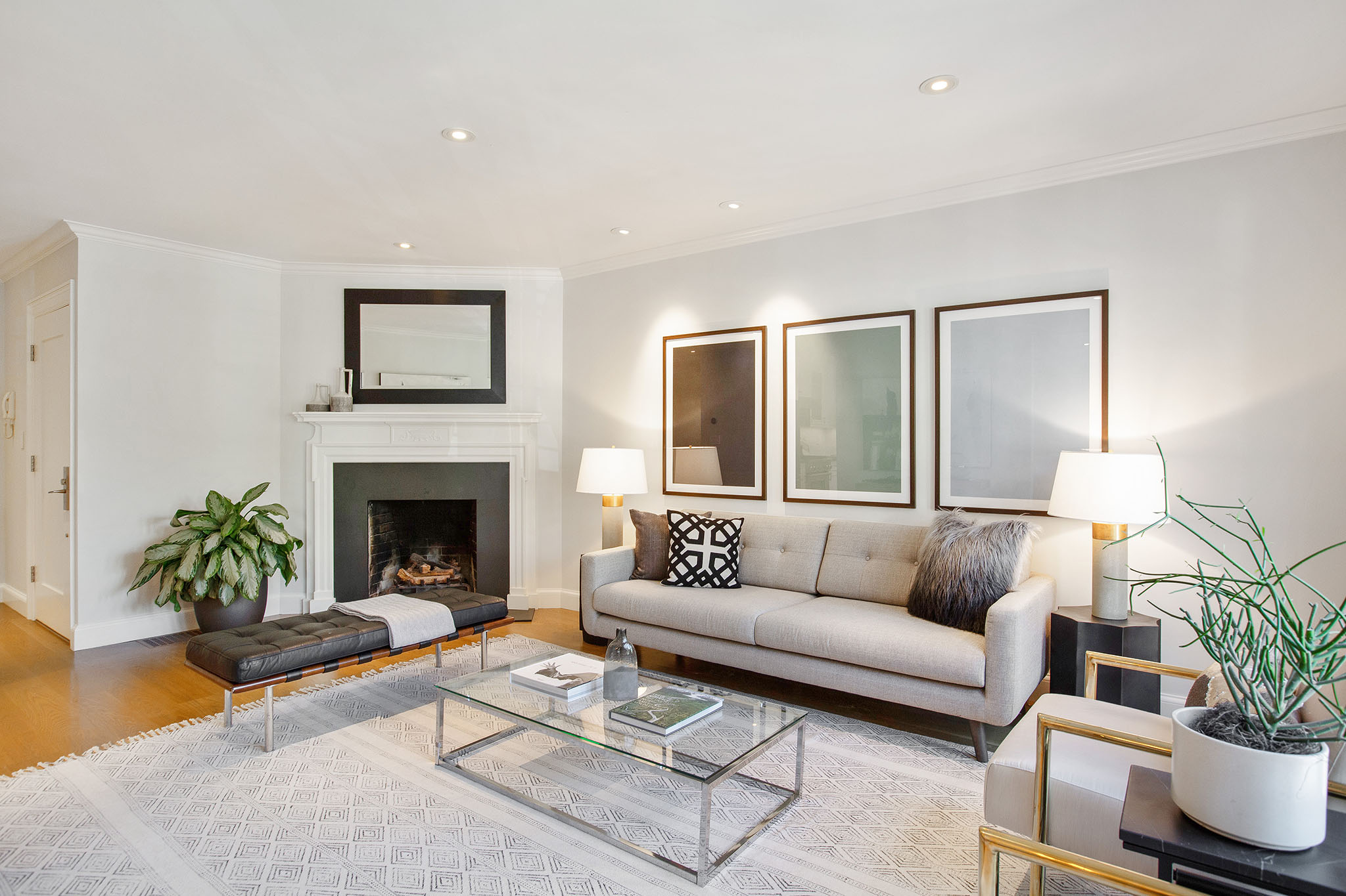 Living room, featuring a corner fireplace