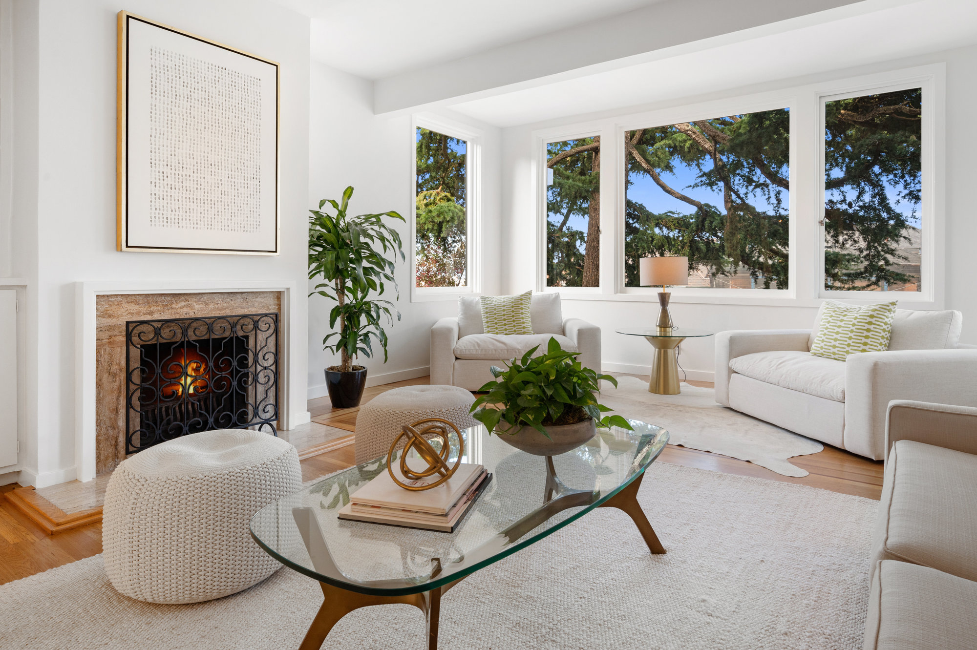 100006.jpg.vs2 Close-up of the fireplace with wood surround, and wrap-around windows