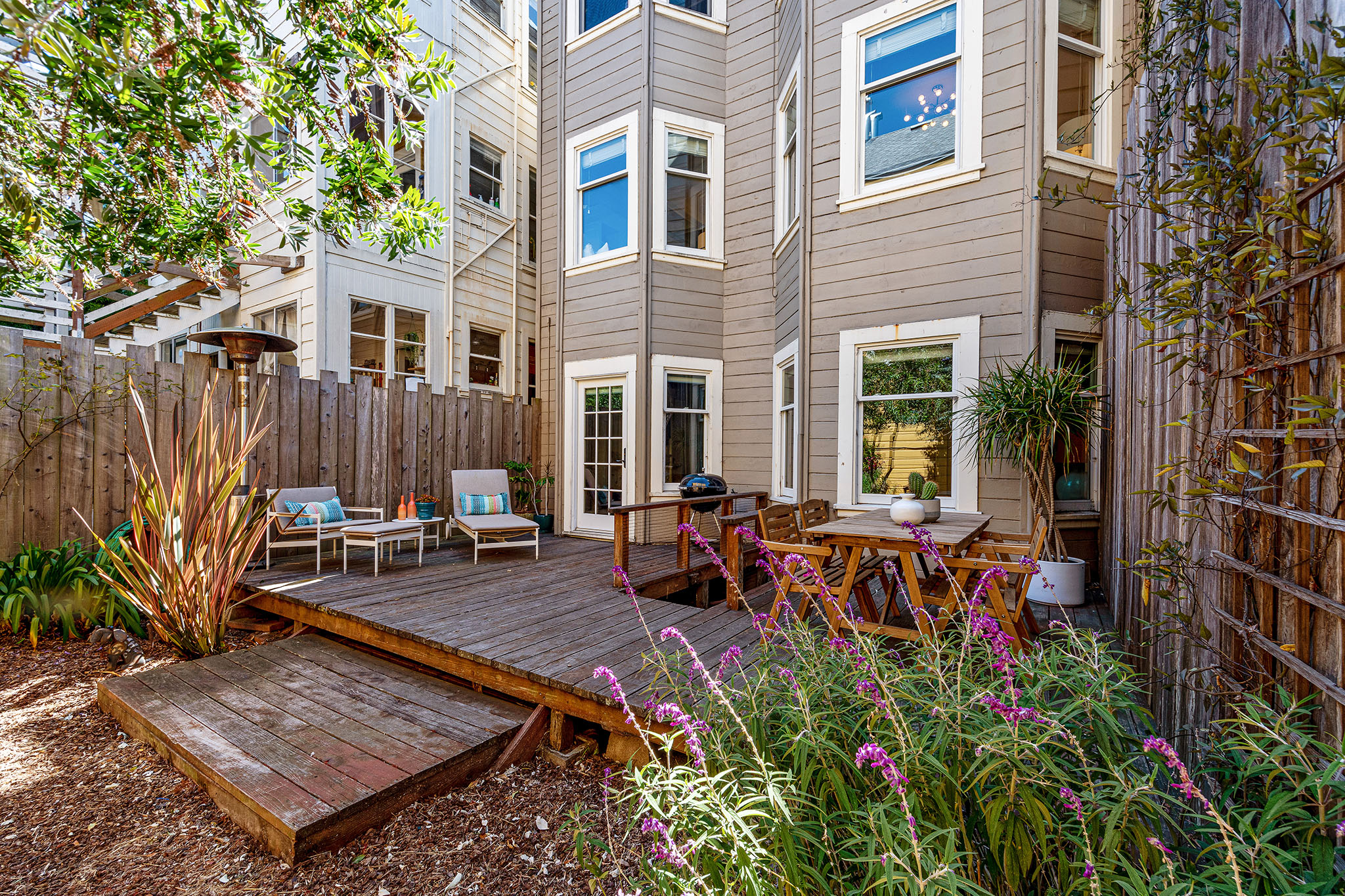 View of the rear deck, showing out door dining area