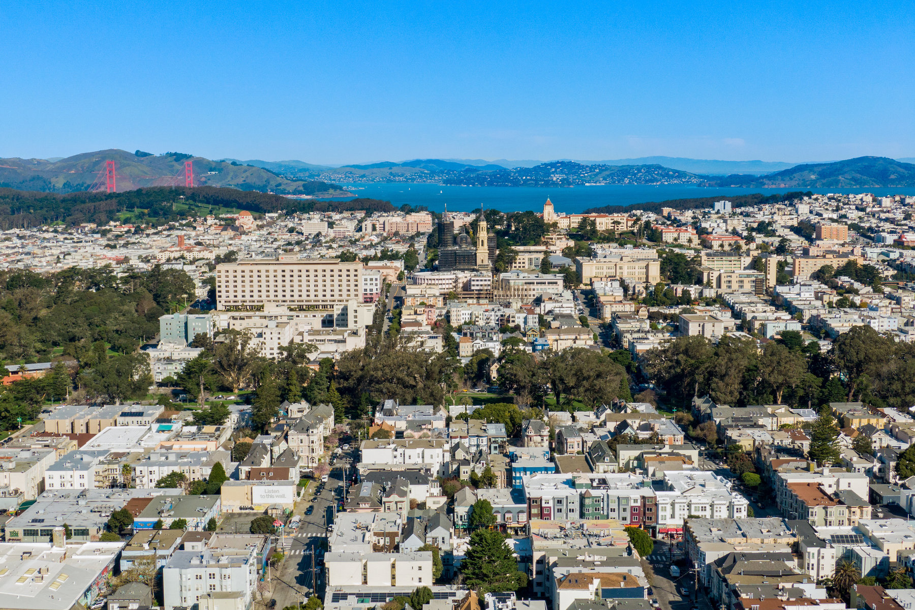 Aerial photo looking over cole valley and inner richmond towards the Golden Gate Bridge.
