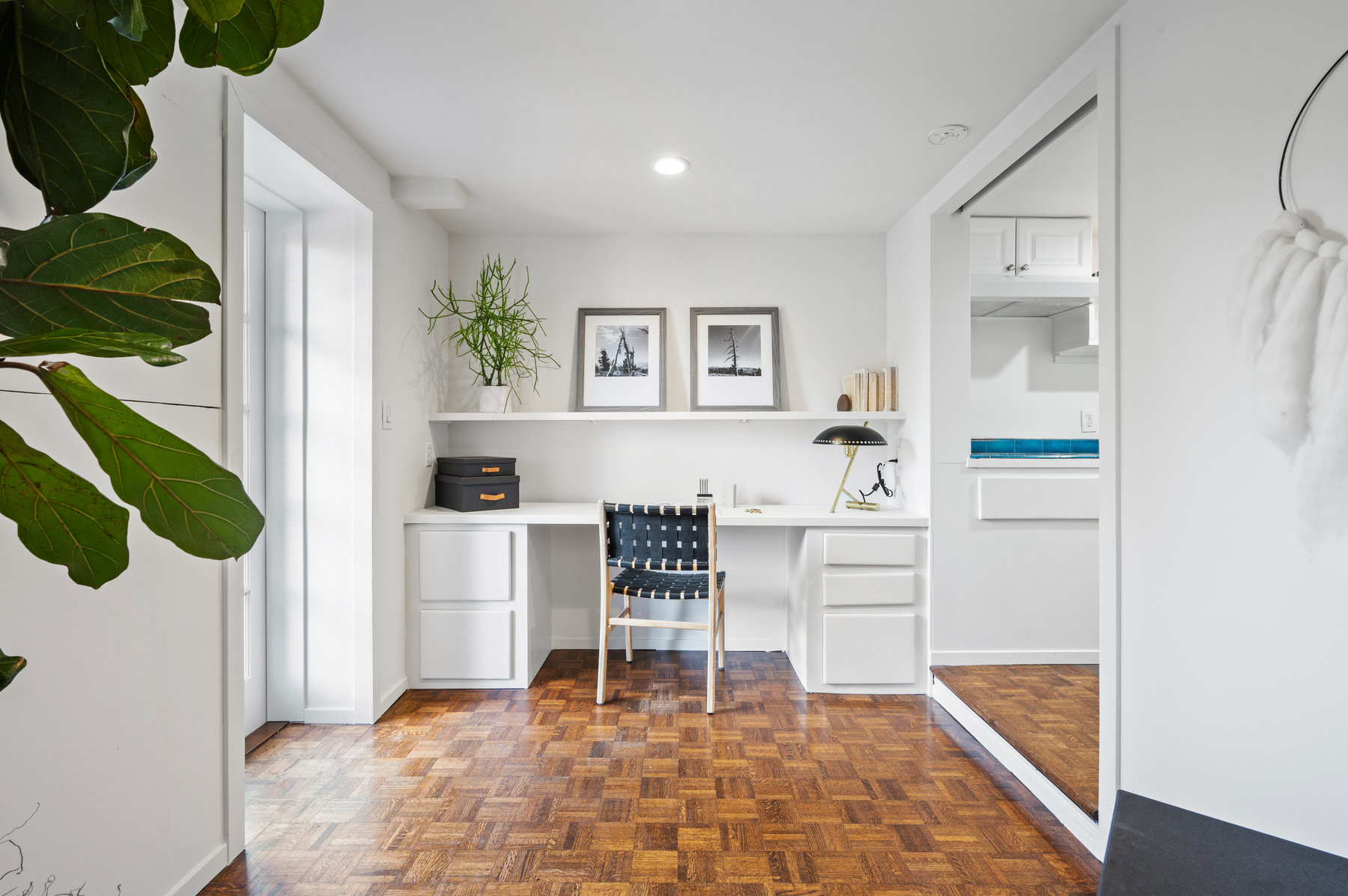 There is a built in office space in lower bonus space. Its to the left of entry way.