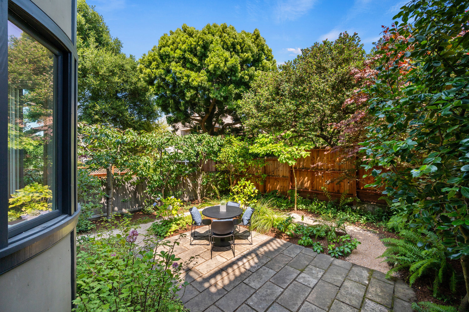 Garden with a patio and fruit trees at 828 Ashbury Street