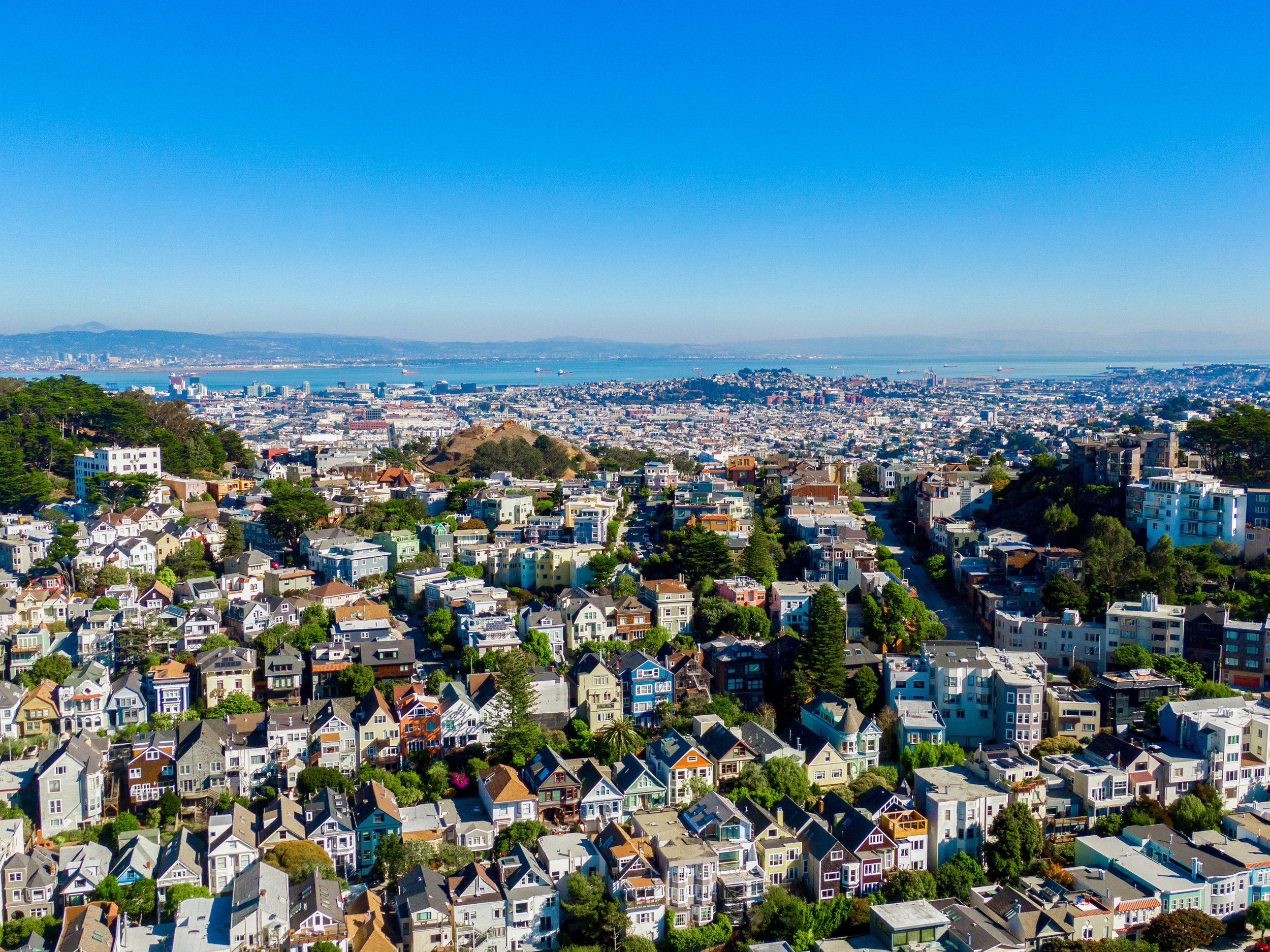 Aerial photo of Cole Valley, highlighting all the beautiful Victorians in the neighborhood.