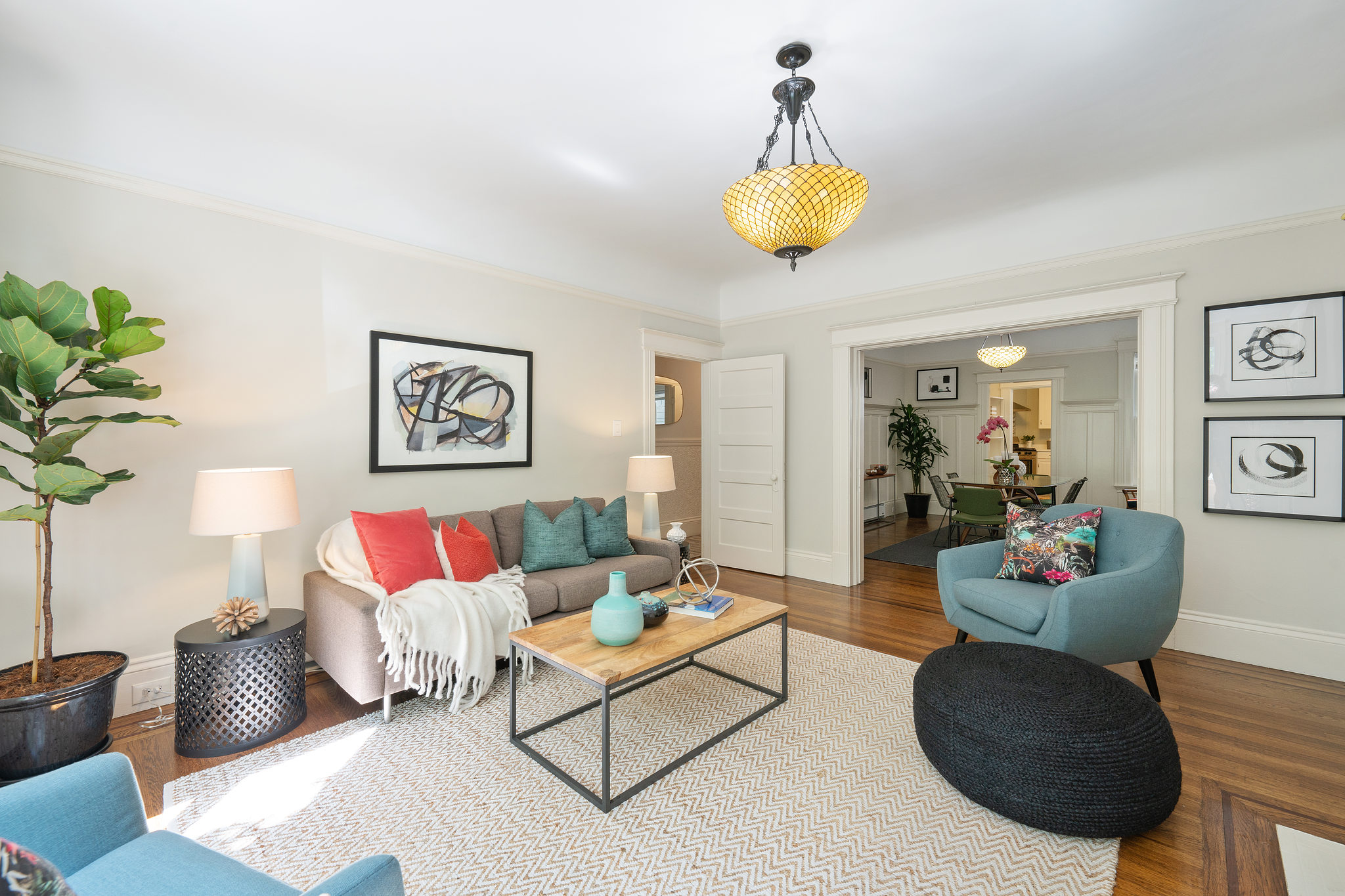 Living room, with a partial view into the adjoining room