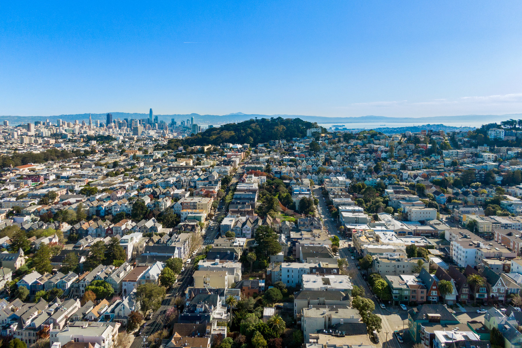Aerial photo looking over the city to the bay.