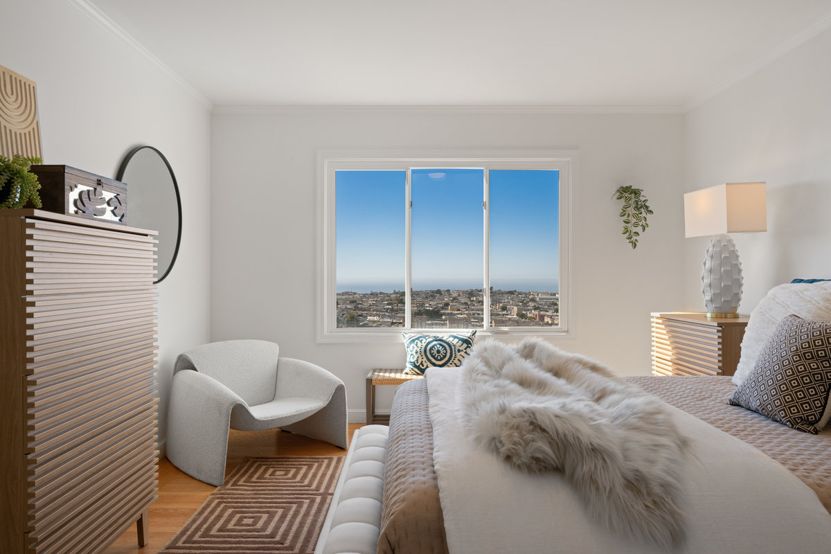 The first bedroom on upper level has stunning ocean views.