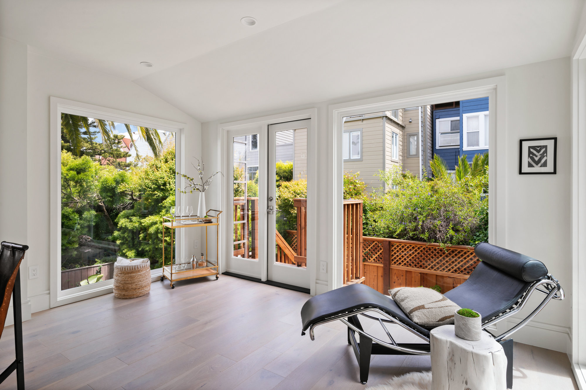 Sitting area has french doors that lead out to fire escape.