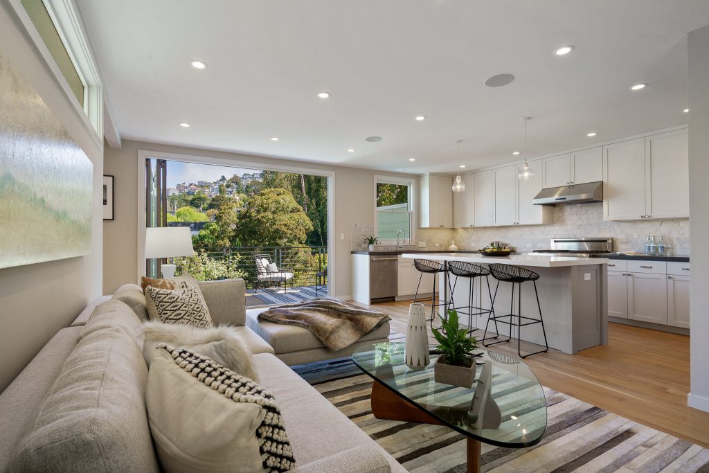 View of the living room featuring a view of Sutro Forest