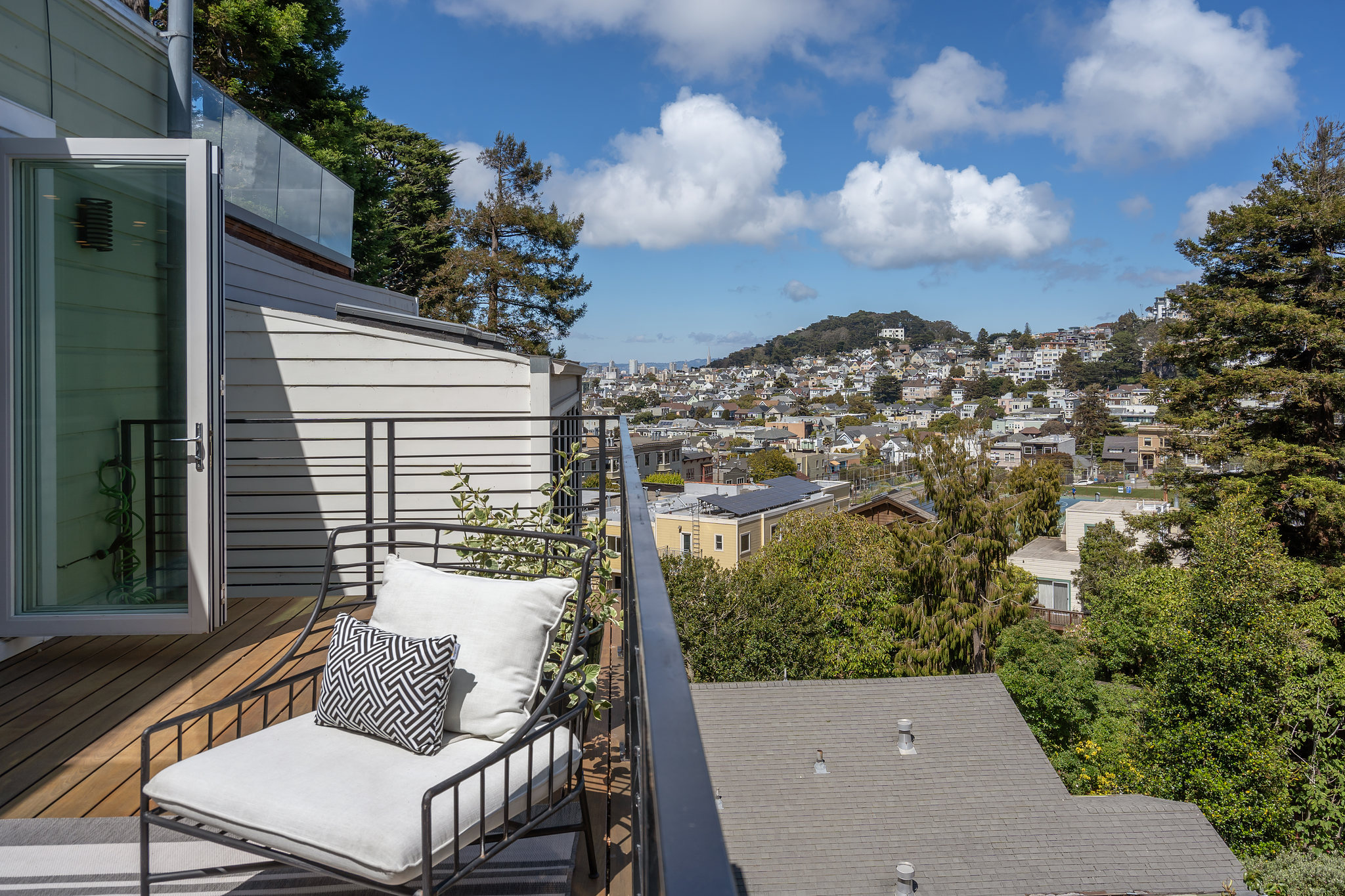 118-woodland-avenue.46233.p4k.030.web A view of Cole Valley and neighboring homes as seen from the railing