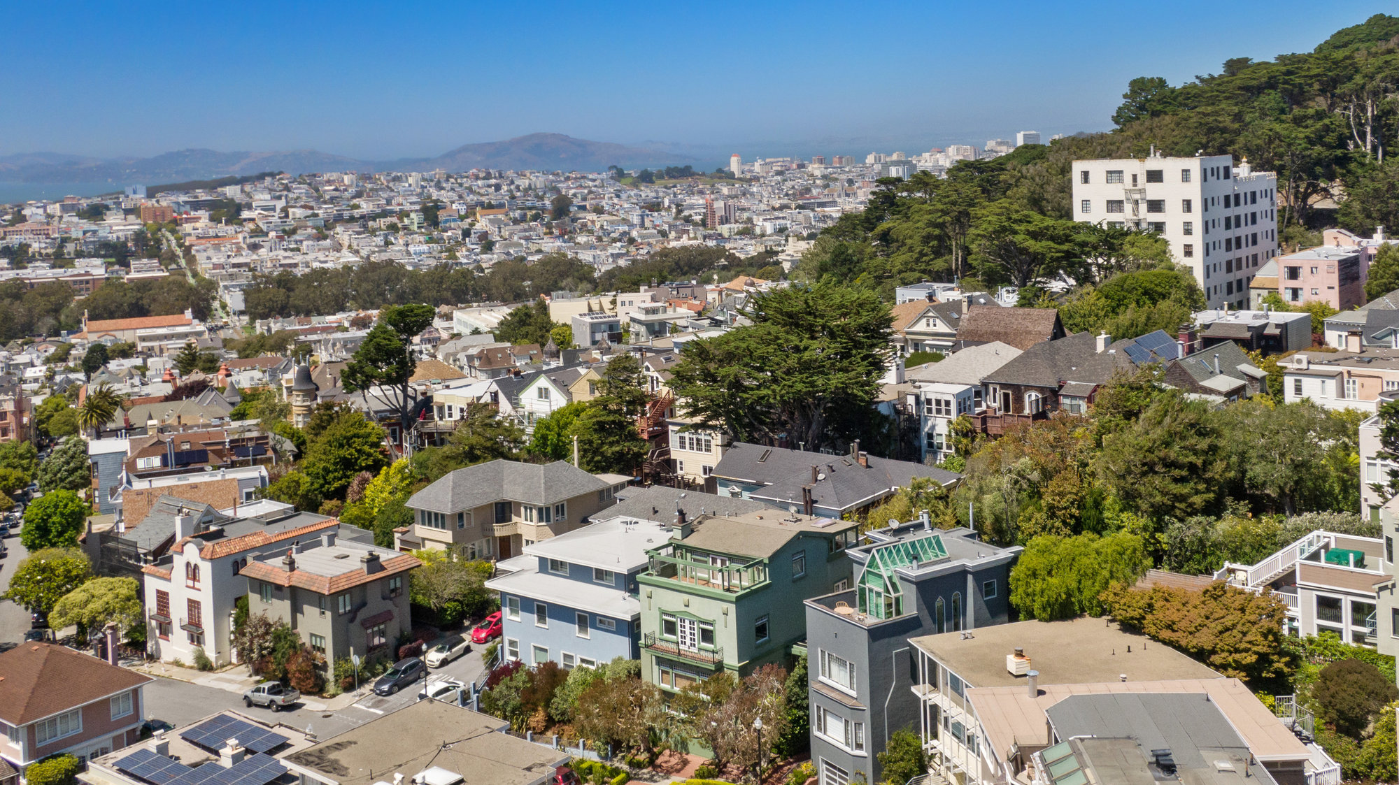 Aerial view of listing 4 Ashbury Terrace, showing proximity to Buena Vista Park and downtown San Francisco