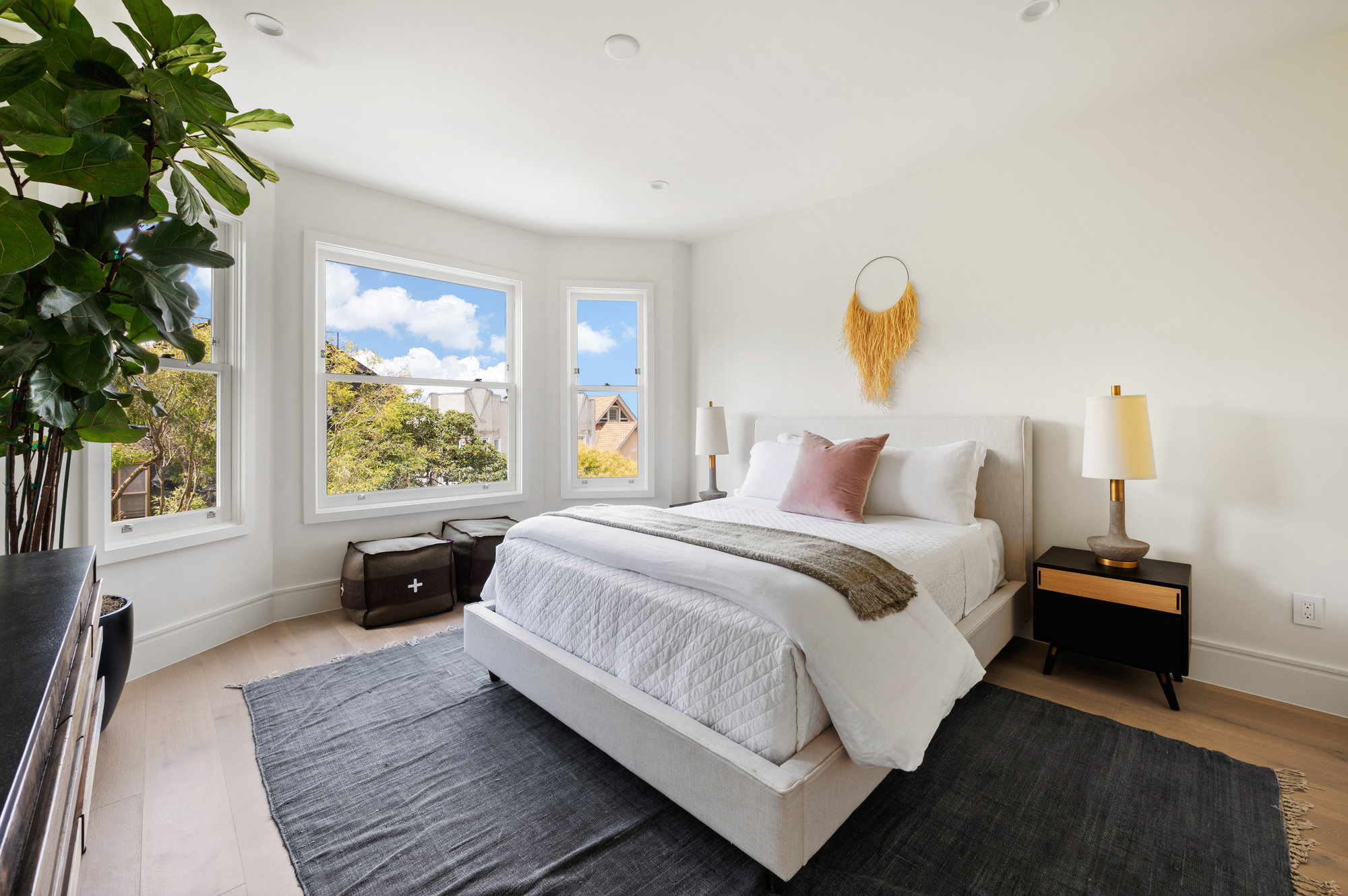 2nd Guest bedroom with large bed and bedside tables.  Also room for a dresser.