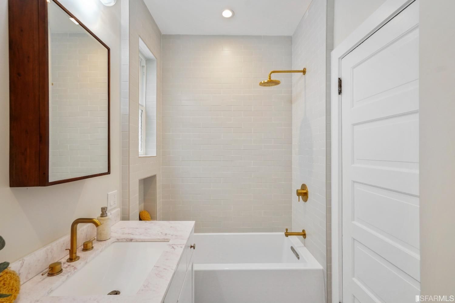 View of a bathroom with large tub and high-end fixtures