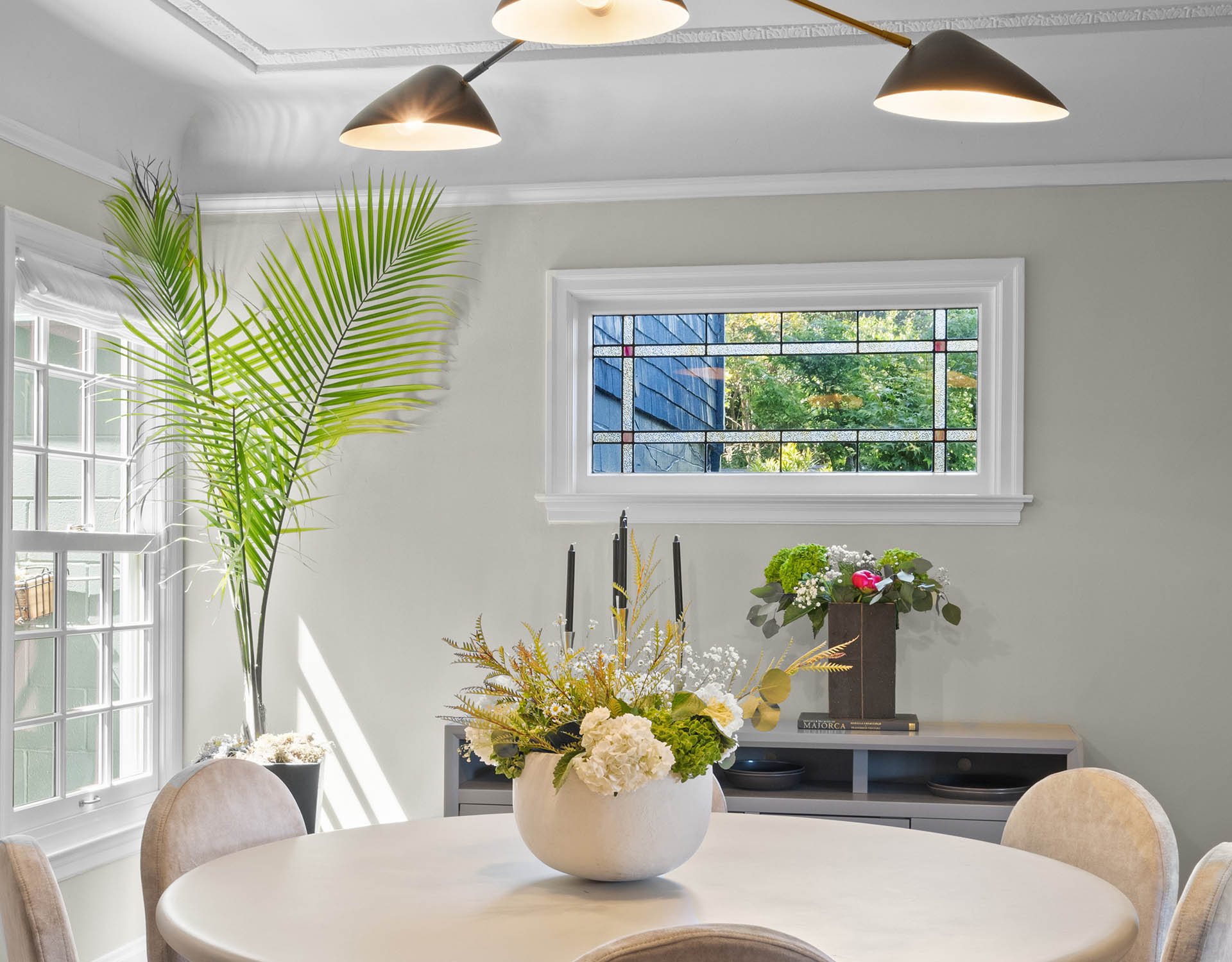 1525willard-dining-table Dining room has two beautiful windows that let in lots of light.