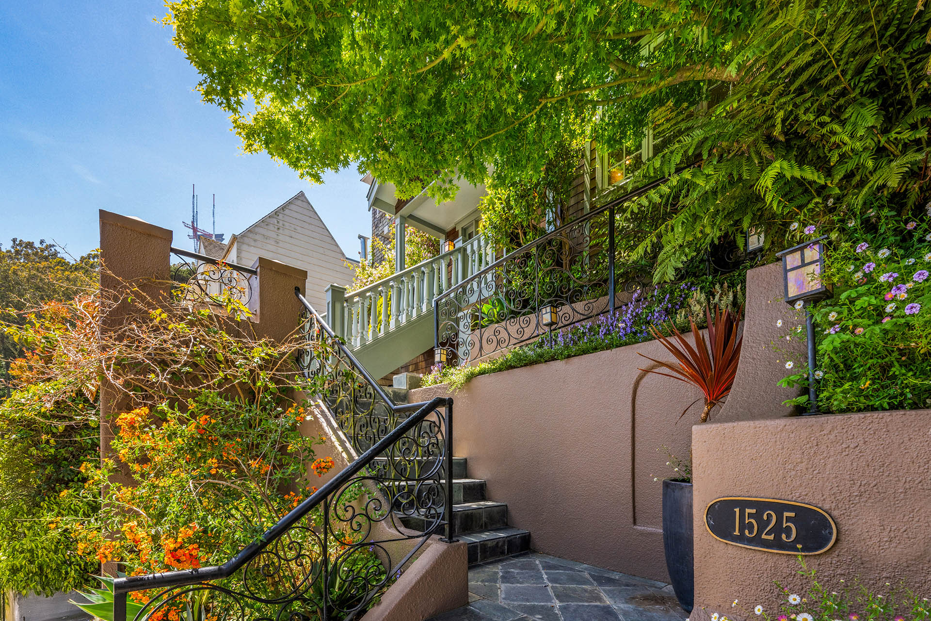 1525willard-front-stairs Photo of the staircase up to the home. Lots of beautiful landscaping.