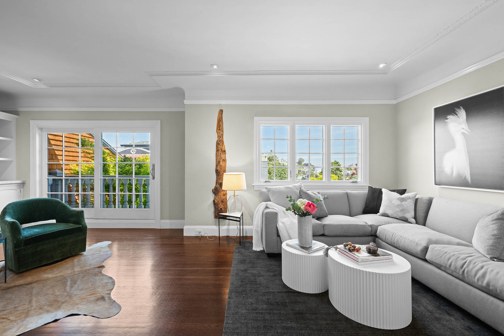 1525willard-living-room-4 Living room has a nice large L shaped couch with stunning windows.