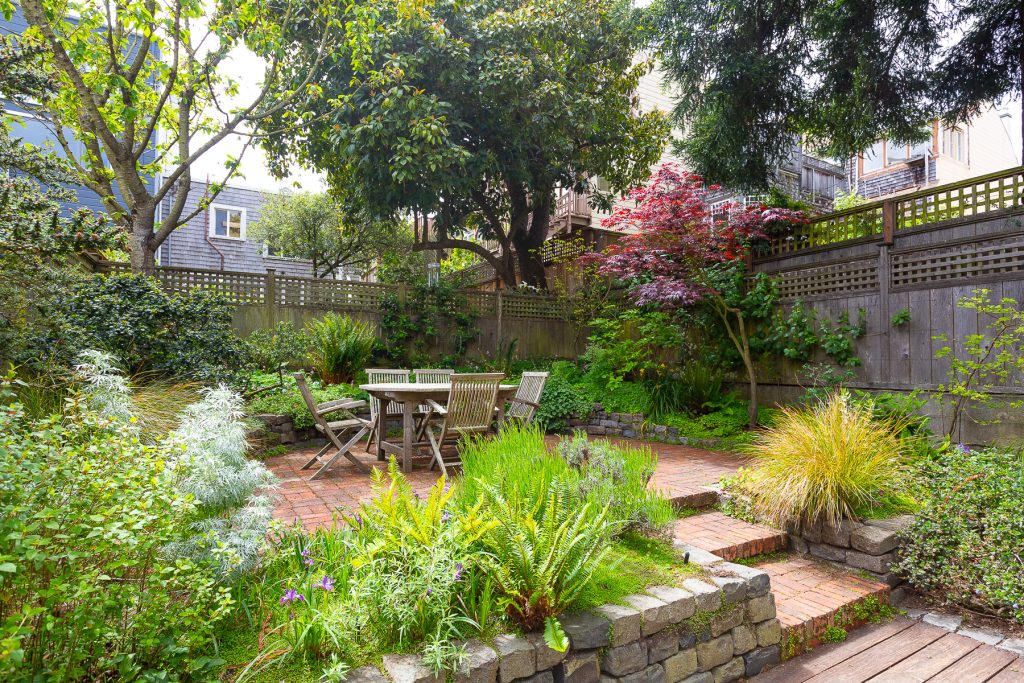 View of the yard and patio area at 157 Alma Street