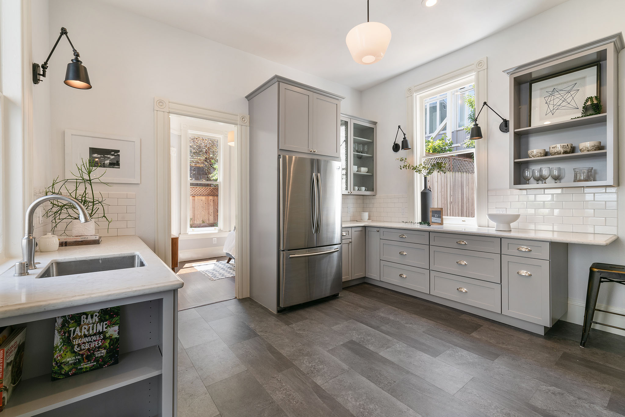 16-1 Kitchen, featuring grey cabinets and tiled floor