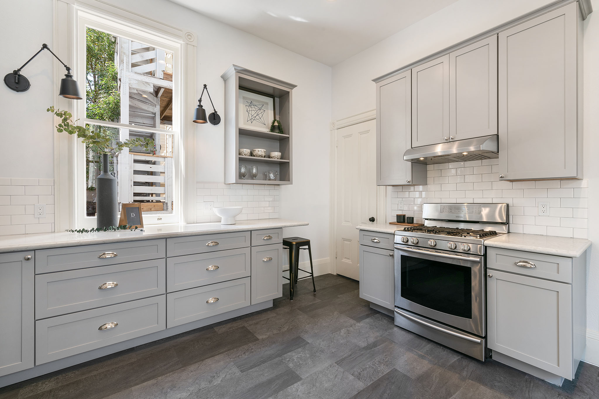 18-2 View of the kitchen, showing the primary cooking area and stainless stove