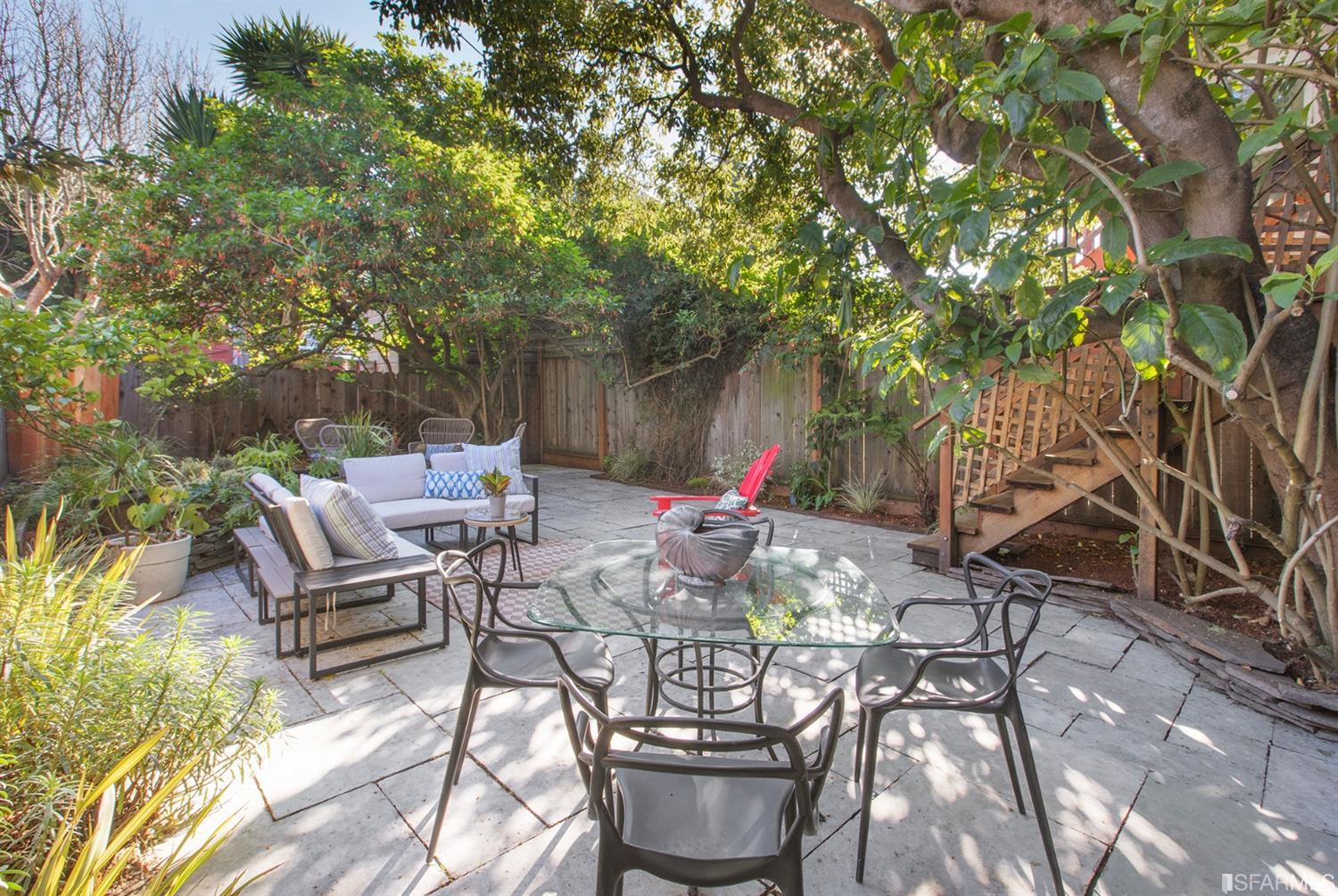 View of the rear patio, featuring an outdoor seating area