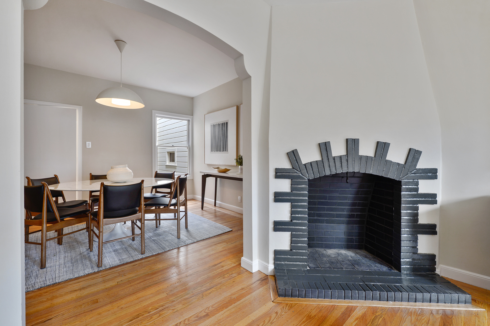 Close-up of ab art deco fireplace with painted brick
