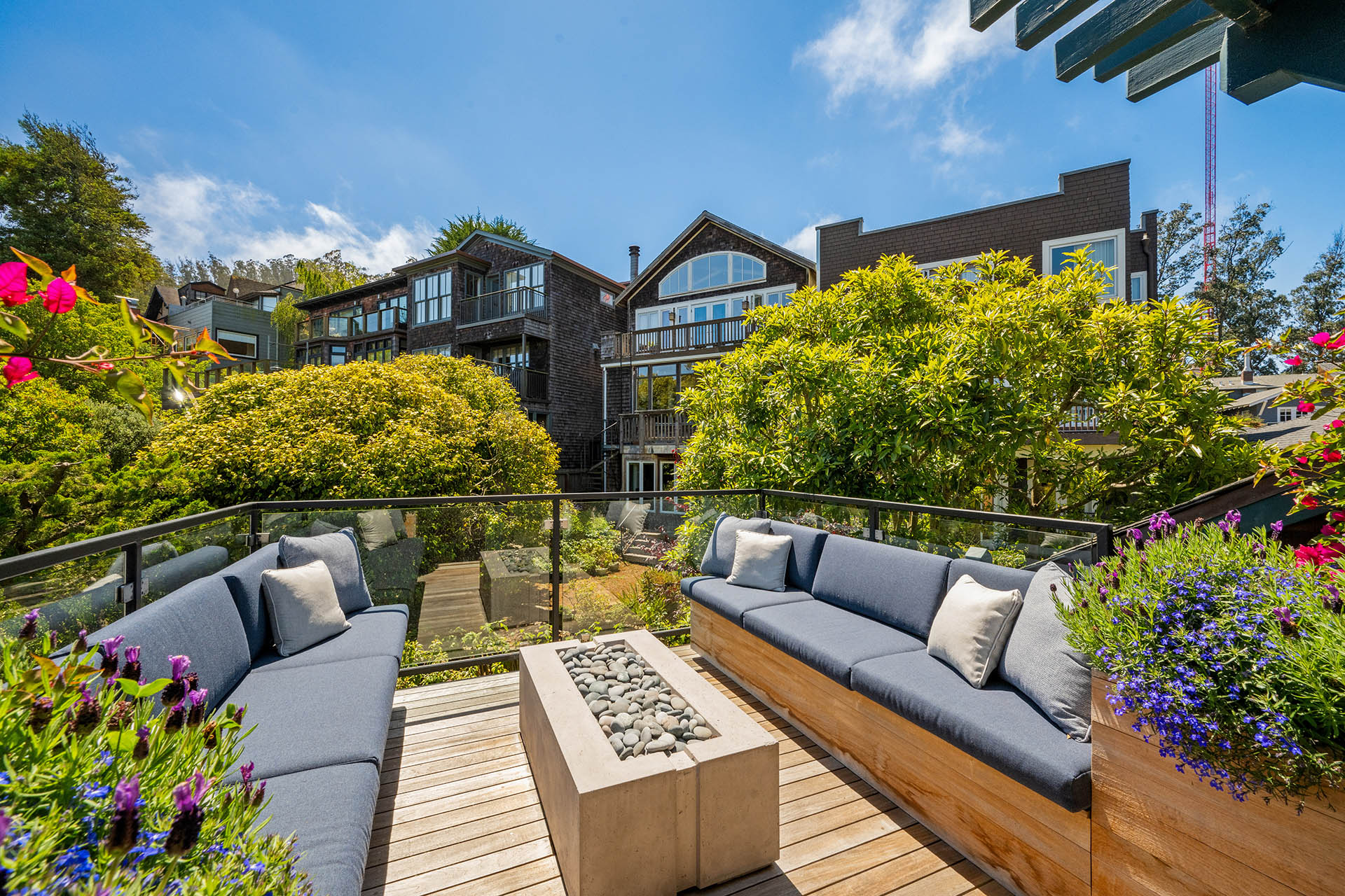 Back deck has gas fireplace and built in benches on each side with flowers
