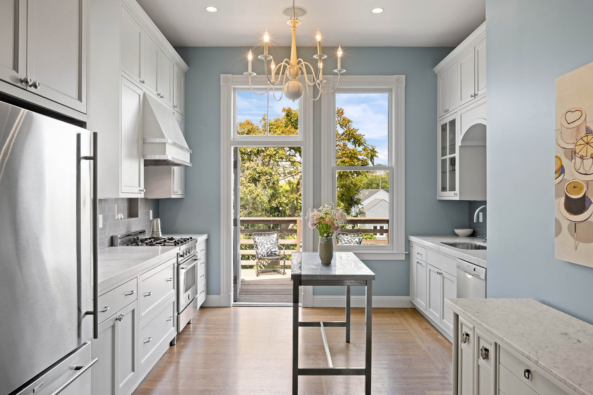 Kitchen is beautiful. There is door to backyard and large window that lets in lots of natural light.
