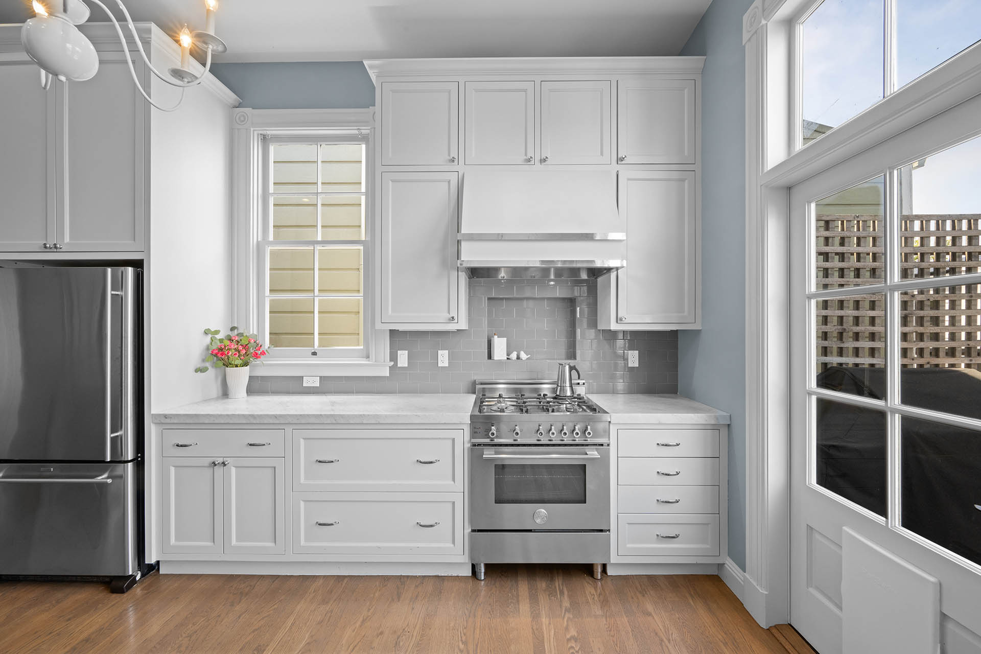 Kitchen has all stainless steel appliances and gas range stove.