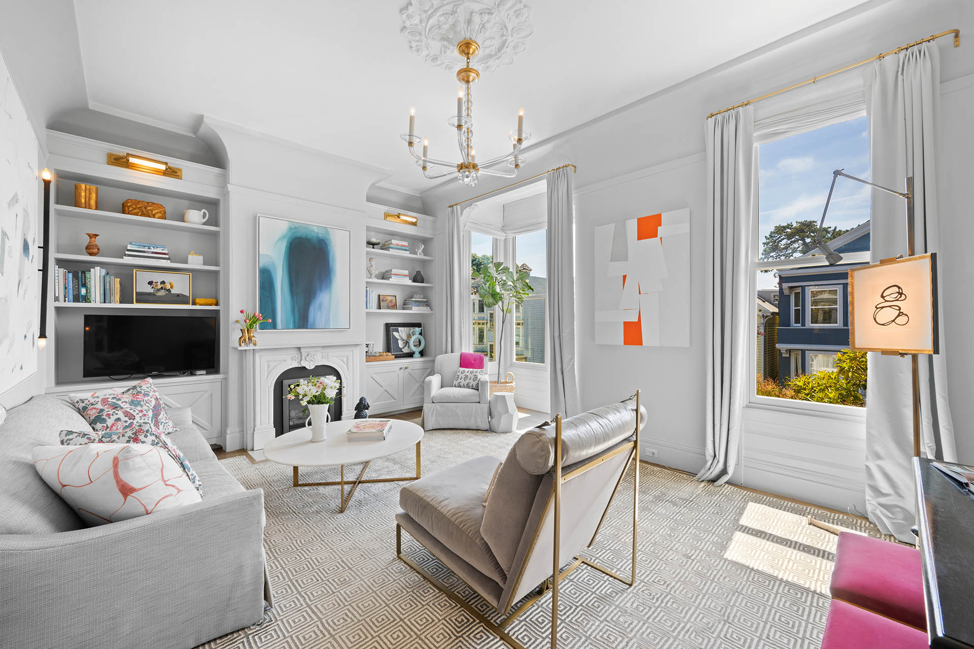 Front living room has large windows and high ceilings.  Lots of natural light.