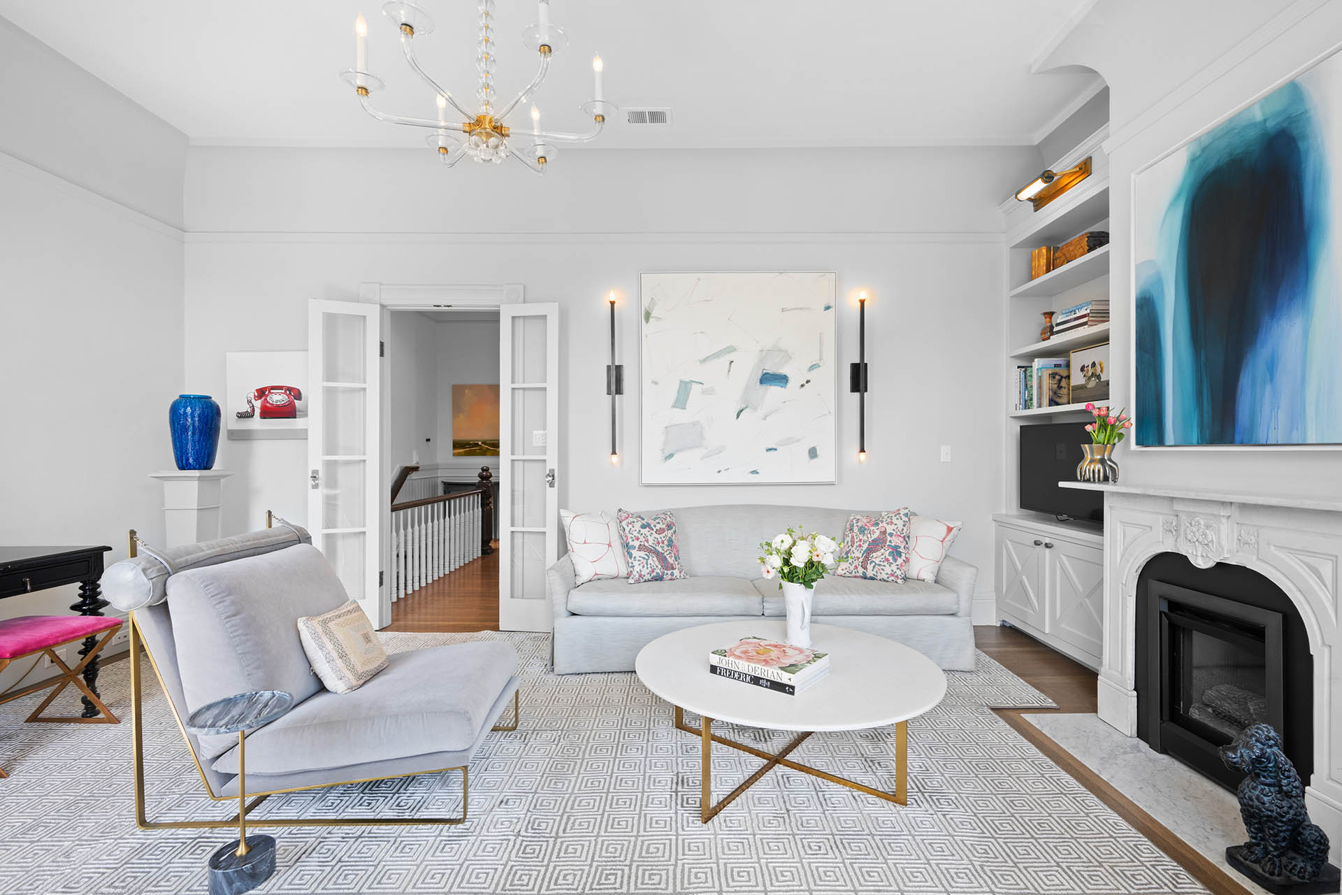 There is french doors that open up into the living room.  There are lots of of pretty classic moldings throughout.